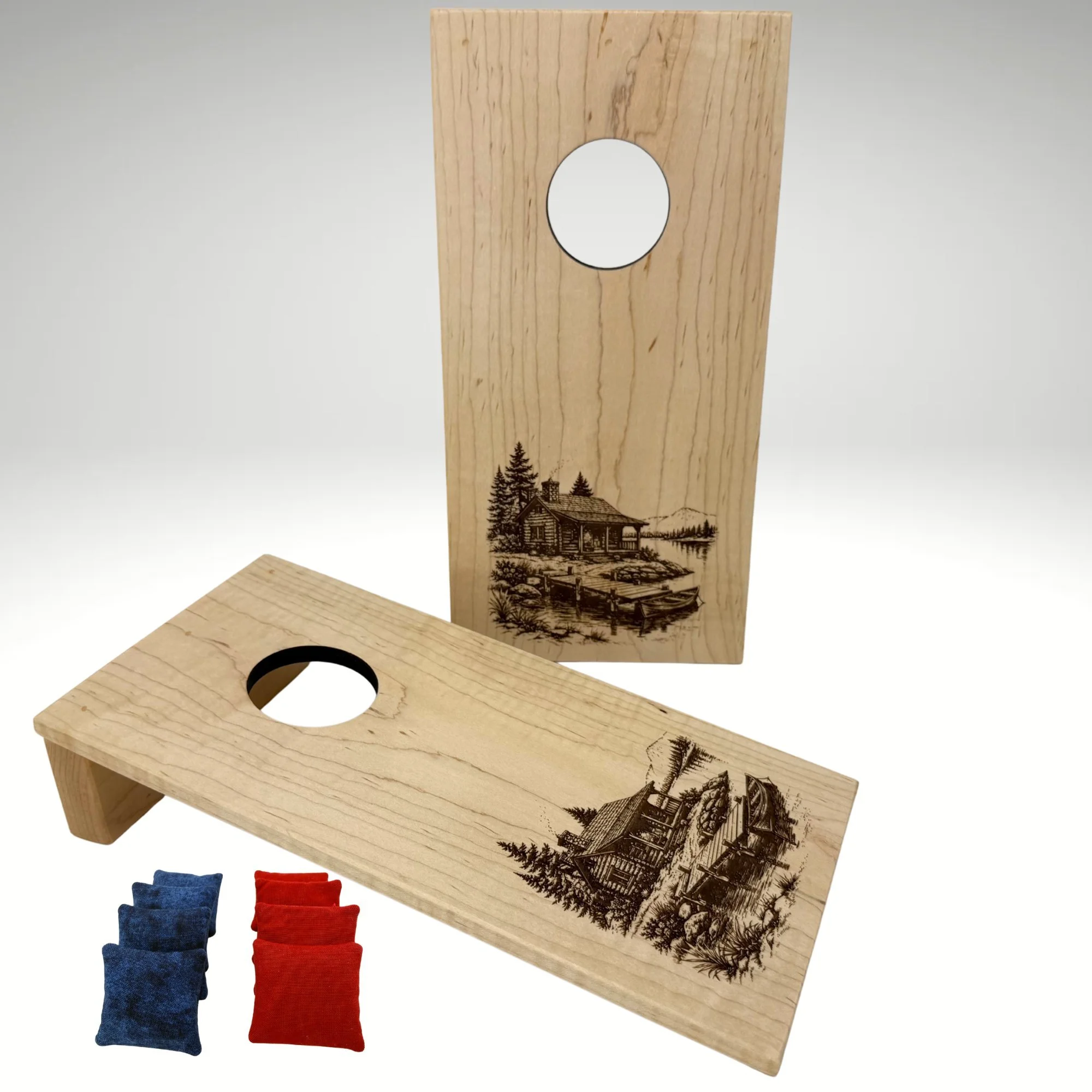 Handcrafted tabletop mini cornhole boards made from solid hardwood, walnut wood, and engraved with a cabin