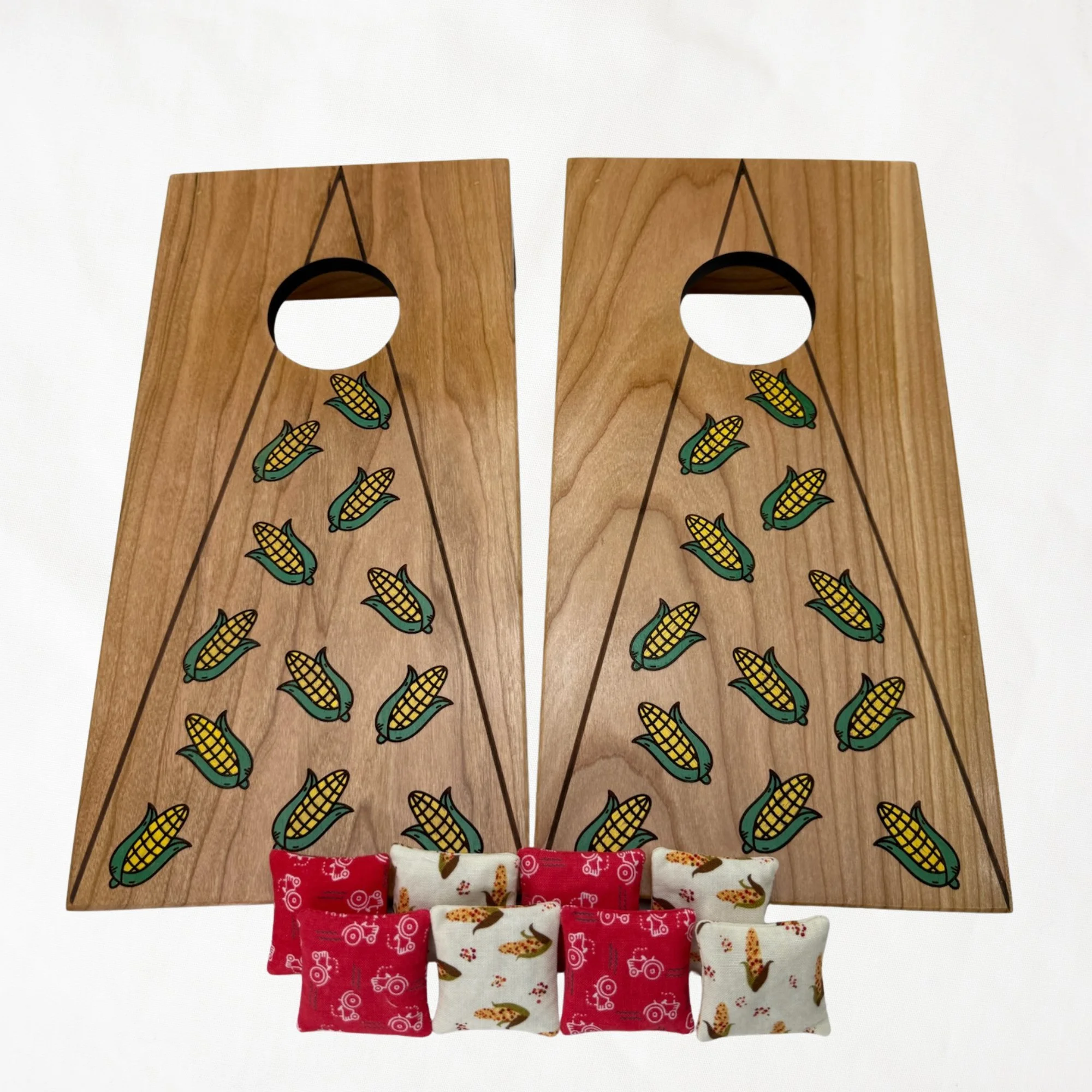 Handcrafted tabletop mini cornhole boards made from solid hardwood, cherry wood, engraved with corn