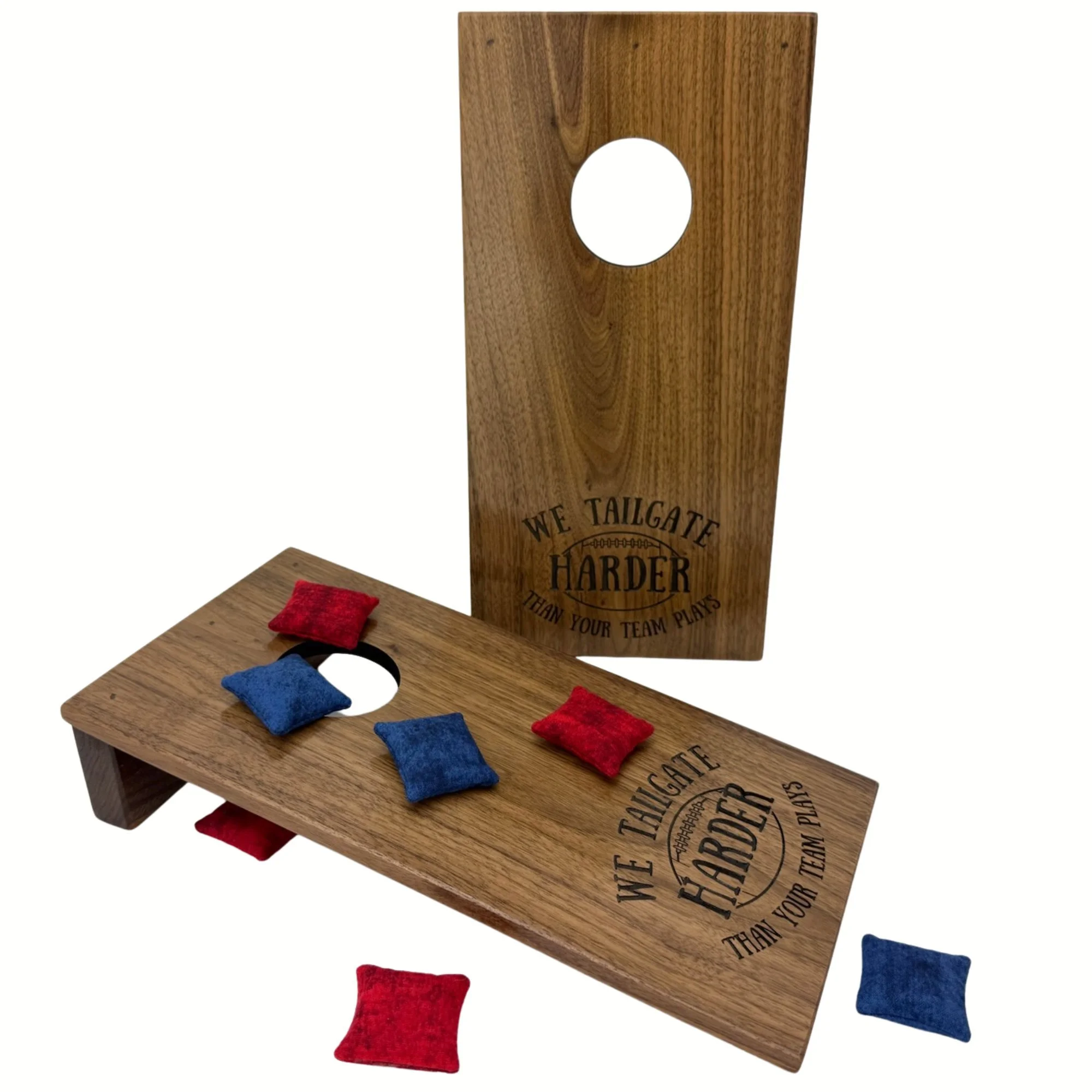 Handcrafted tabletop mini cornhole boards made from solid hardwood, walnut wood, and engraved with tailgating