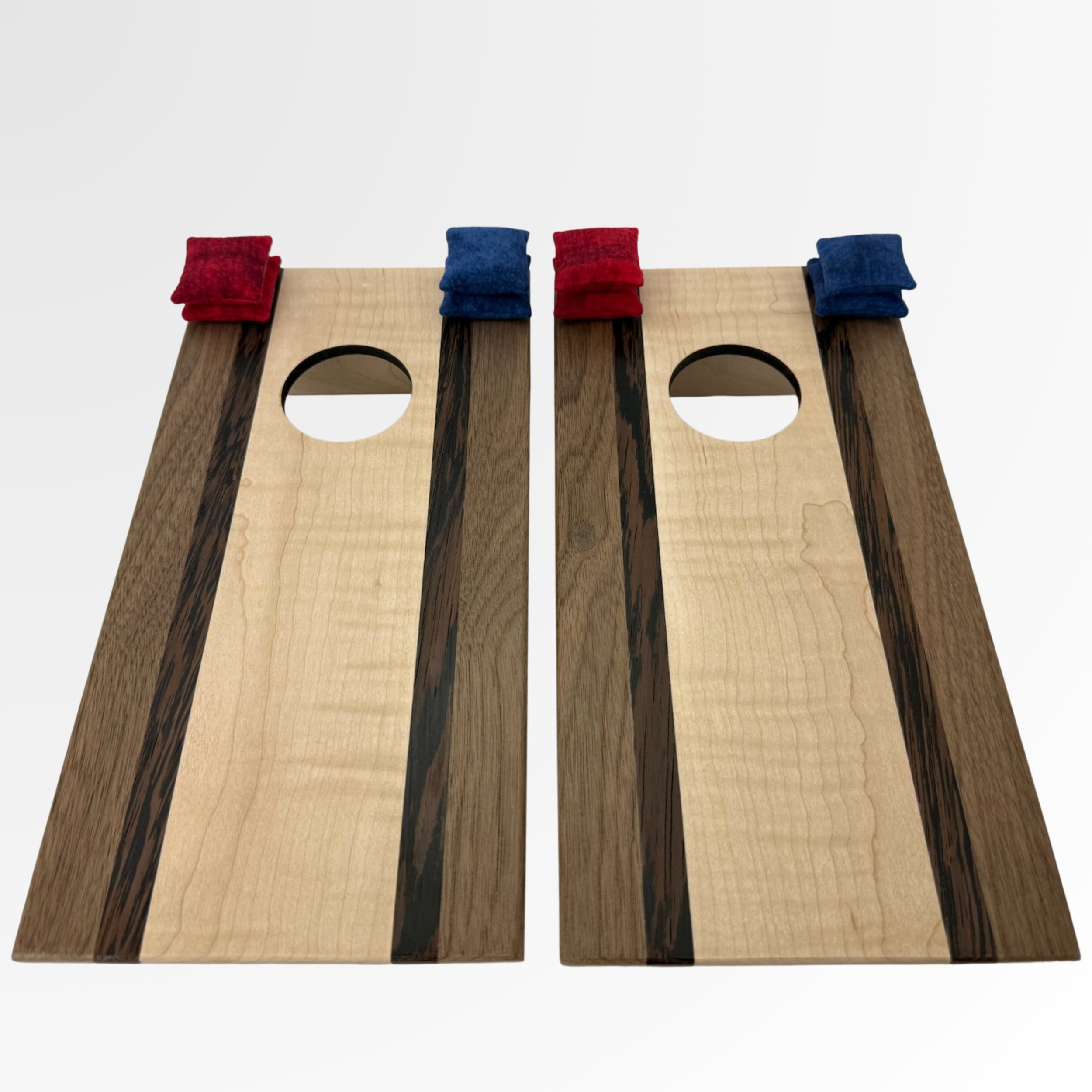 Handcrafted tabletop mini cornhole boards made from solid hardwood,  curly maple center with walnut and wenge border
