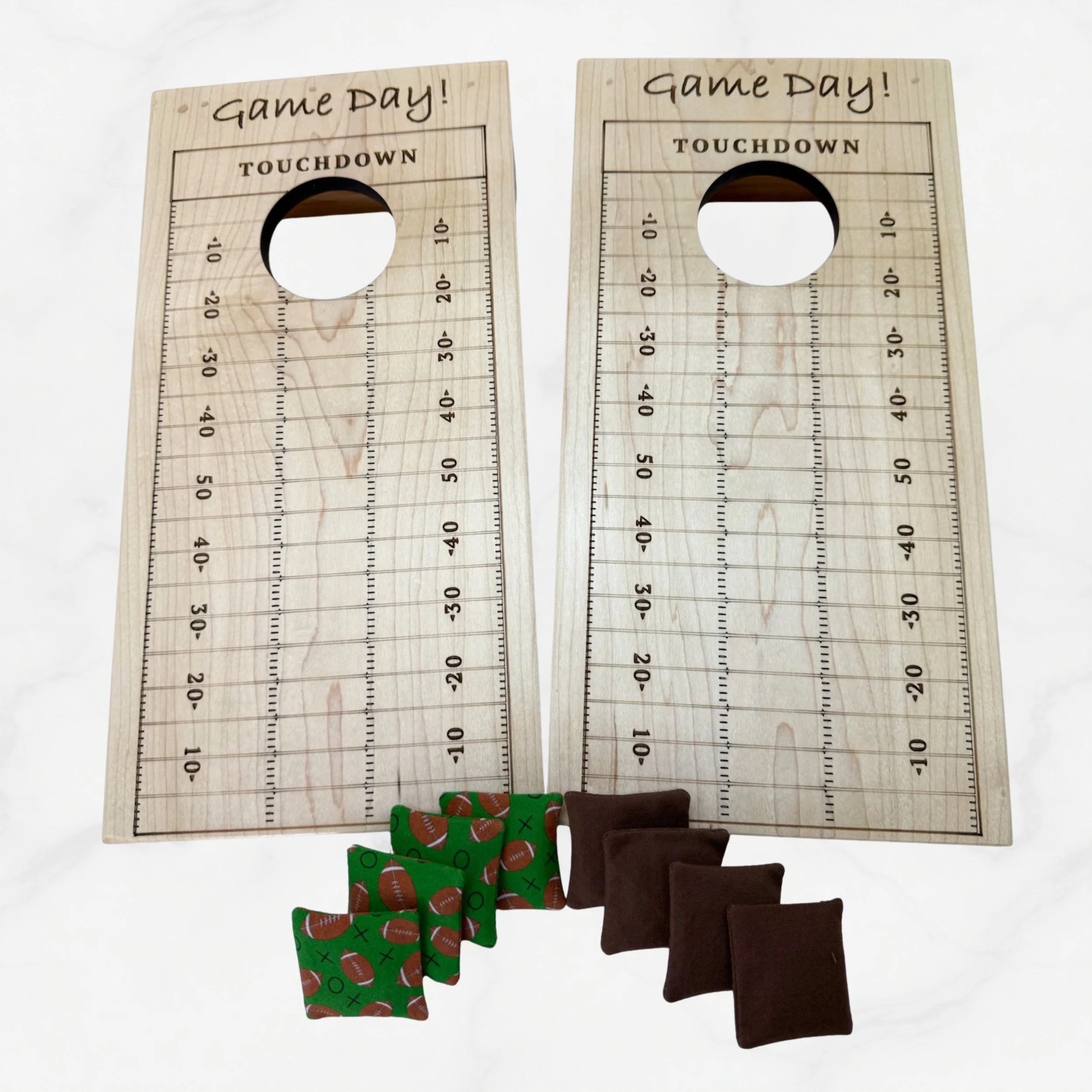 Handcrafted tabletop mini cornhole boards made from solid hardwood, maple wood, engraved with game day
