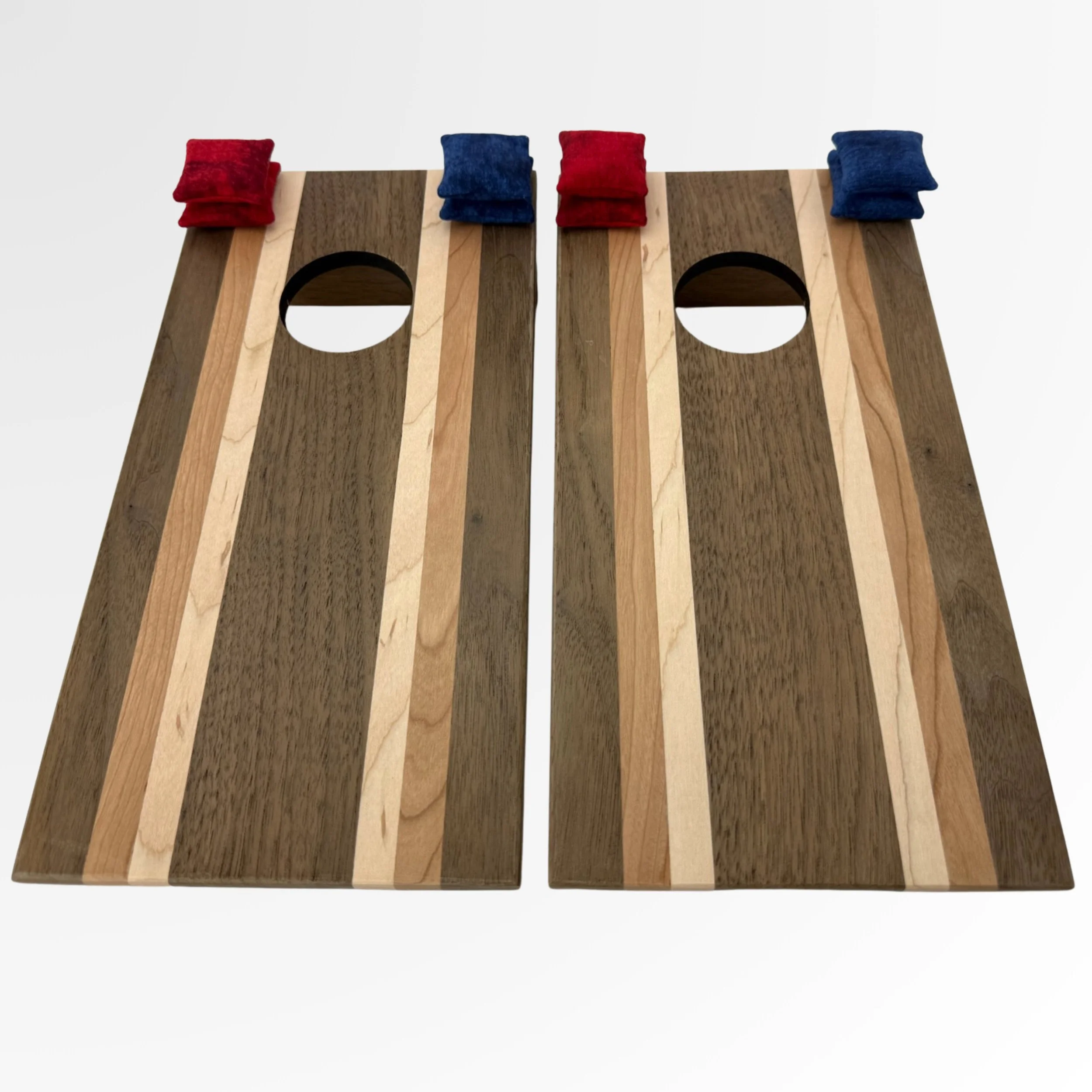 Handcrafted tabletop mini cornhole boards made from solid hardwood, walnut wood with cherry and maple stripes
