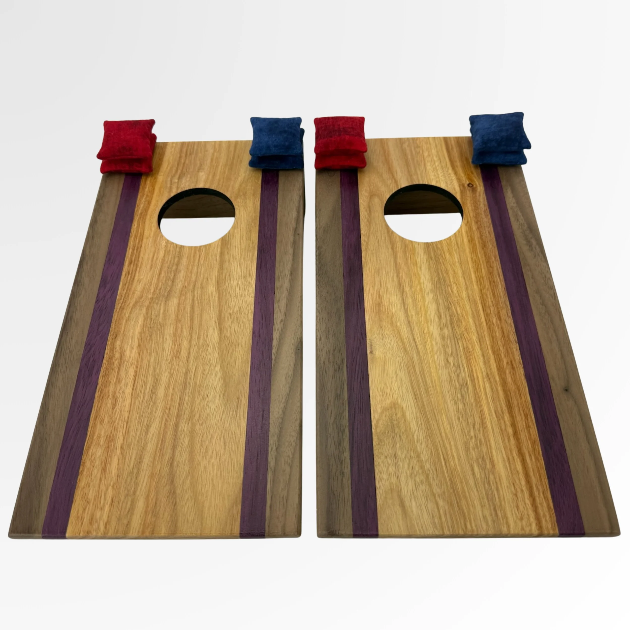 Handcrafted tabletop mini cornhole boards made from solid hardwood, walnut, purple heart, canary