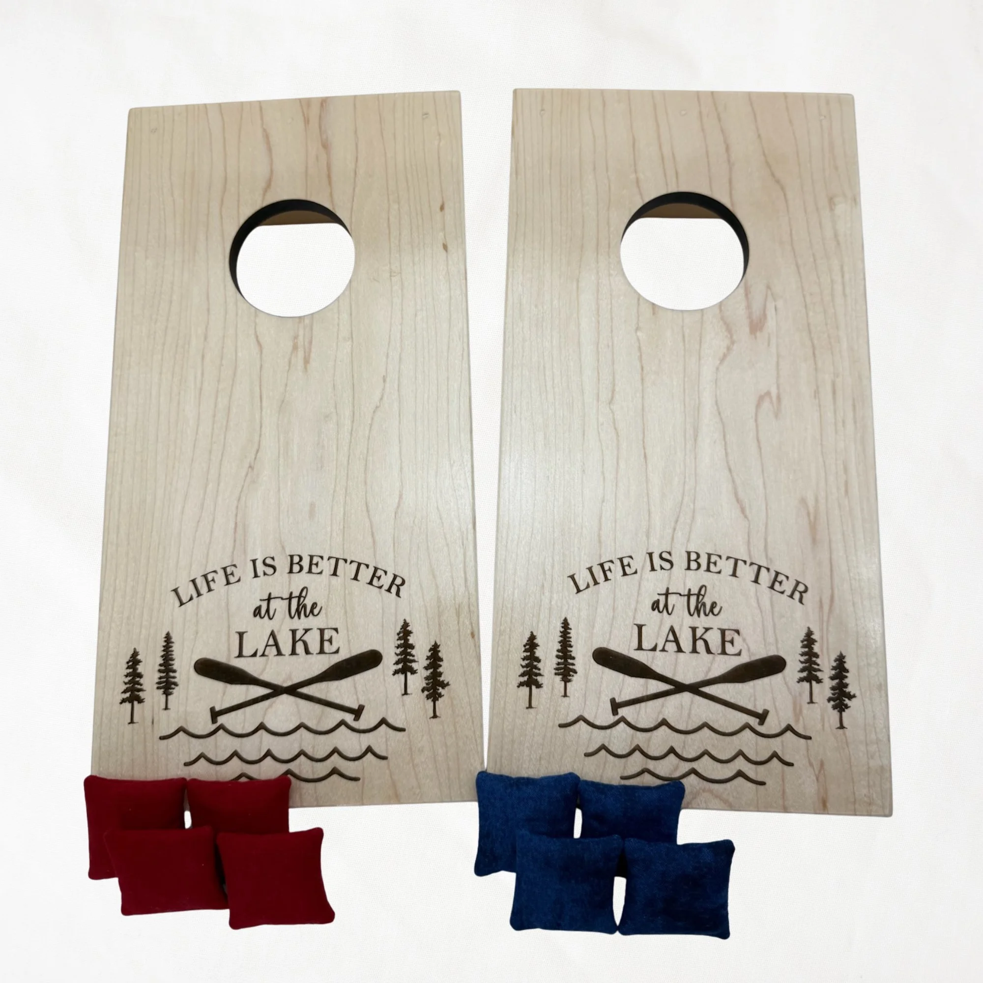 Handcrafted tabletop mini cornhole boards made from solid hardwood, maple wood, engraved with lake life