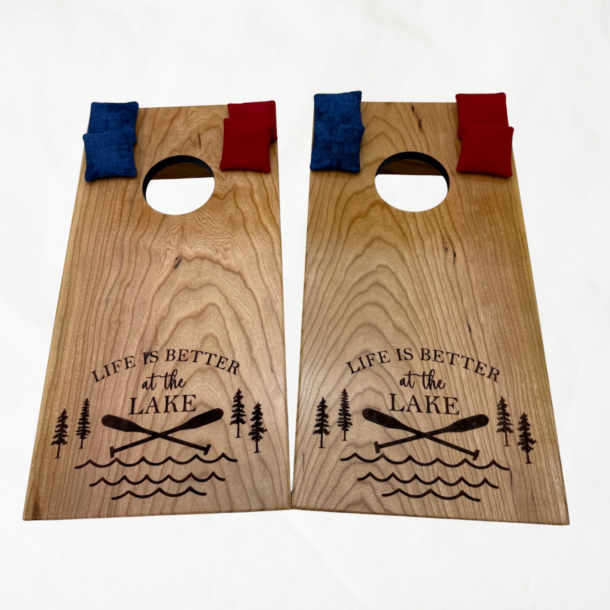Handcrafted tabletop mini cornhole boards made from solid hardwood, cherry wood, engraved with lake life
