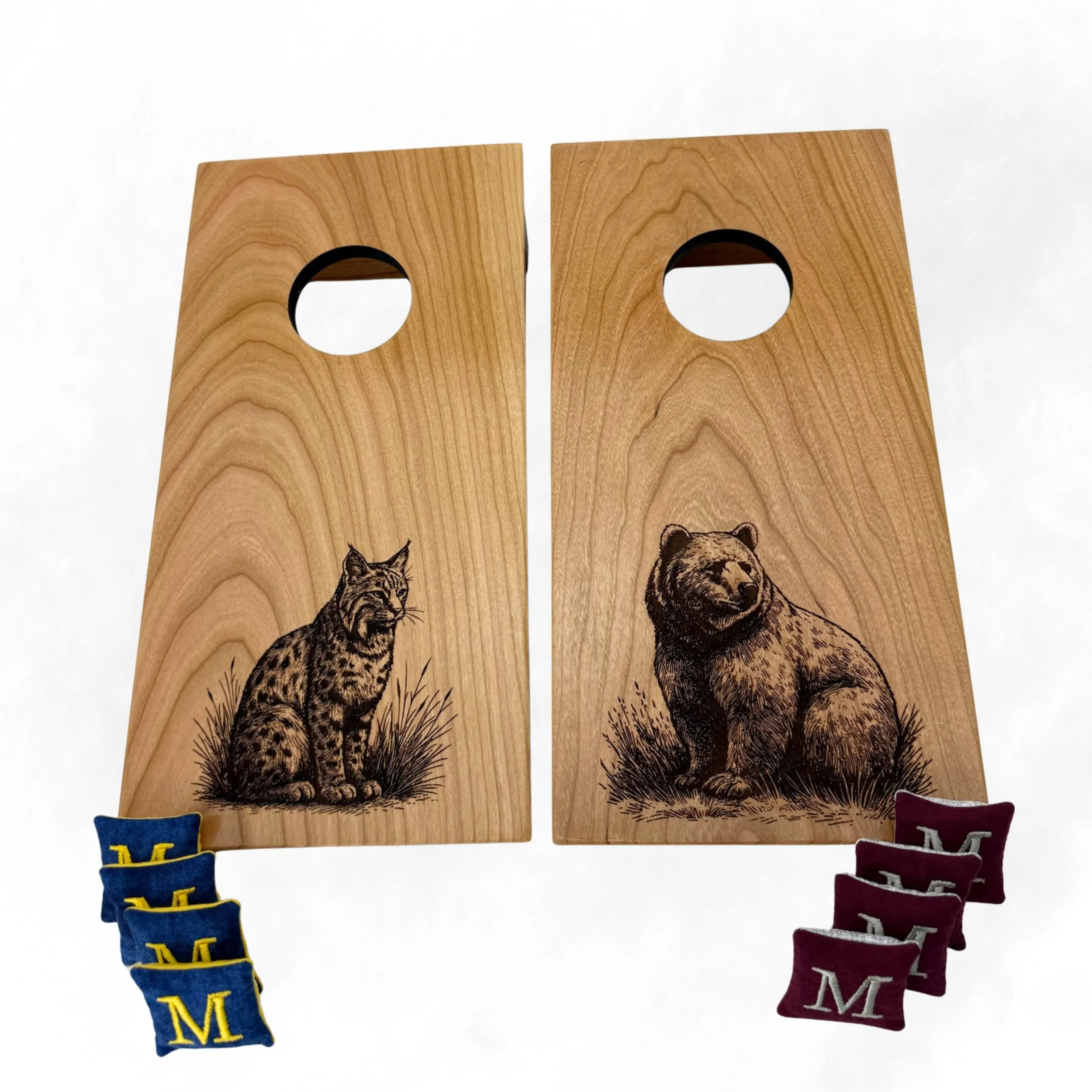 Handcrafted tabletop mini cornhole boards made from solid hardwood, cherry wood, engraved with grizzly & bobcat