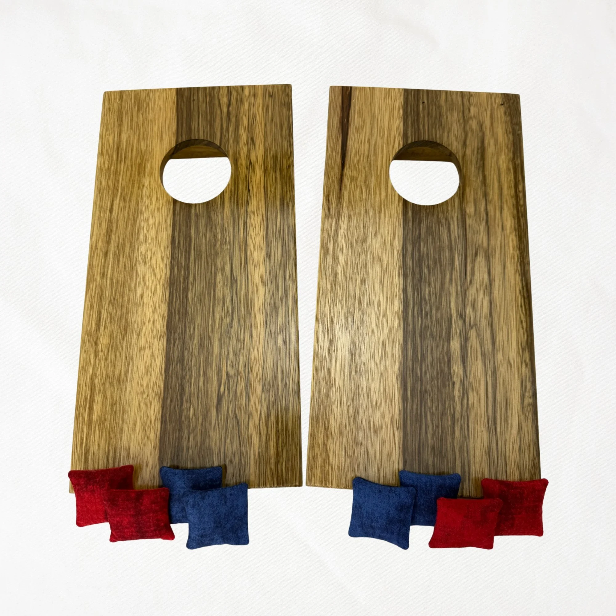 Handcrafted tabletop mini cornhole boards made from solid hardwood, black limba wood,