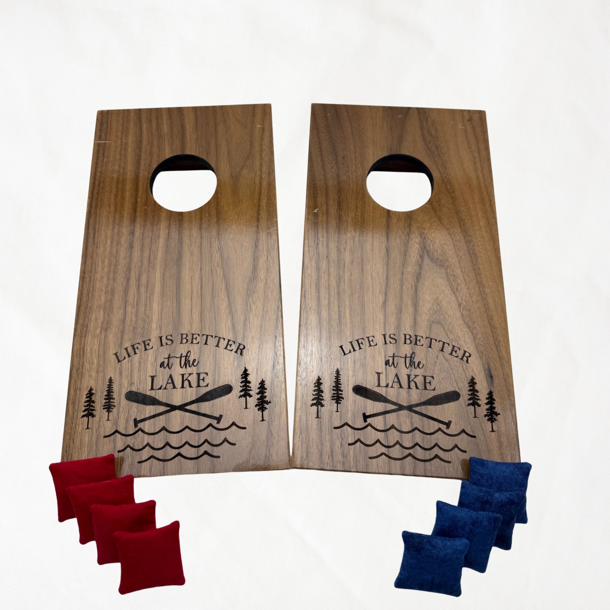 Handcrafted tabletop mini cornhole boards made from solid hardwood, walnut wood, engraved with lake life
