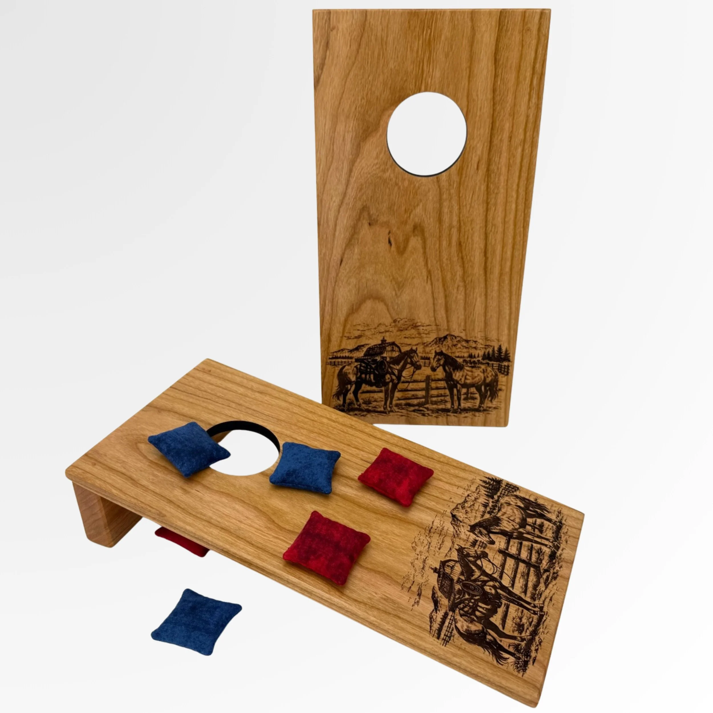 Handcrafted tabletop mini cornhole boards made from solid hardwood, cherry wood engraved with ranch scene