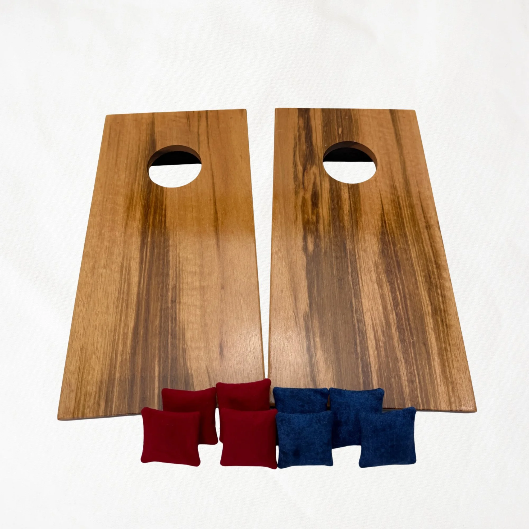 Handcrafted tabletop mini cornhole boards made from solid hardwood, tiger wood