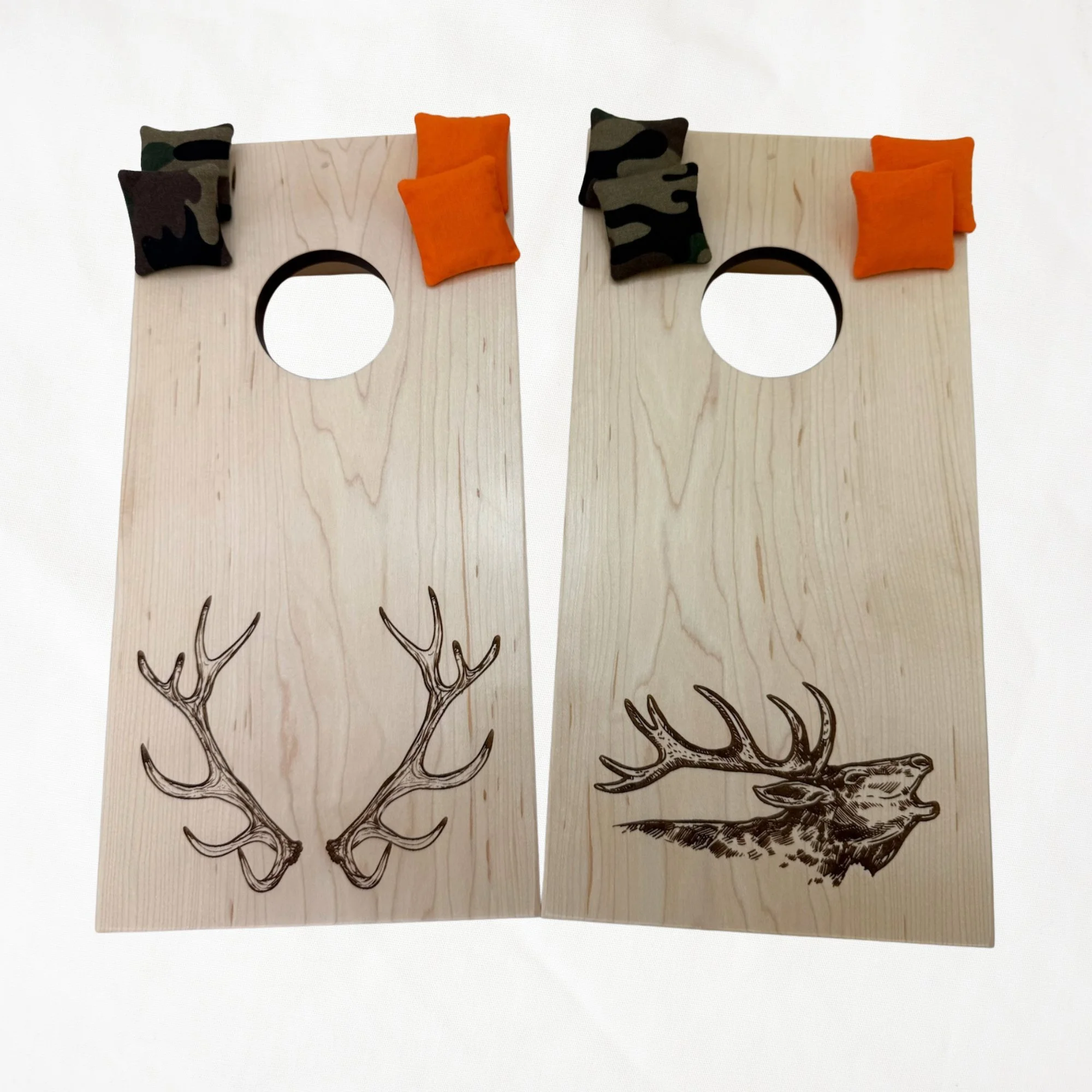 Handcrafted tabletop mini cornhole boards made from solid hardwood, maple wood, engraved with elk