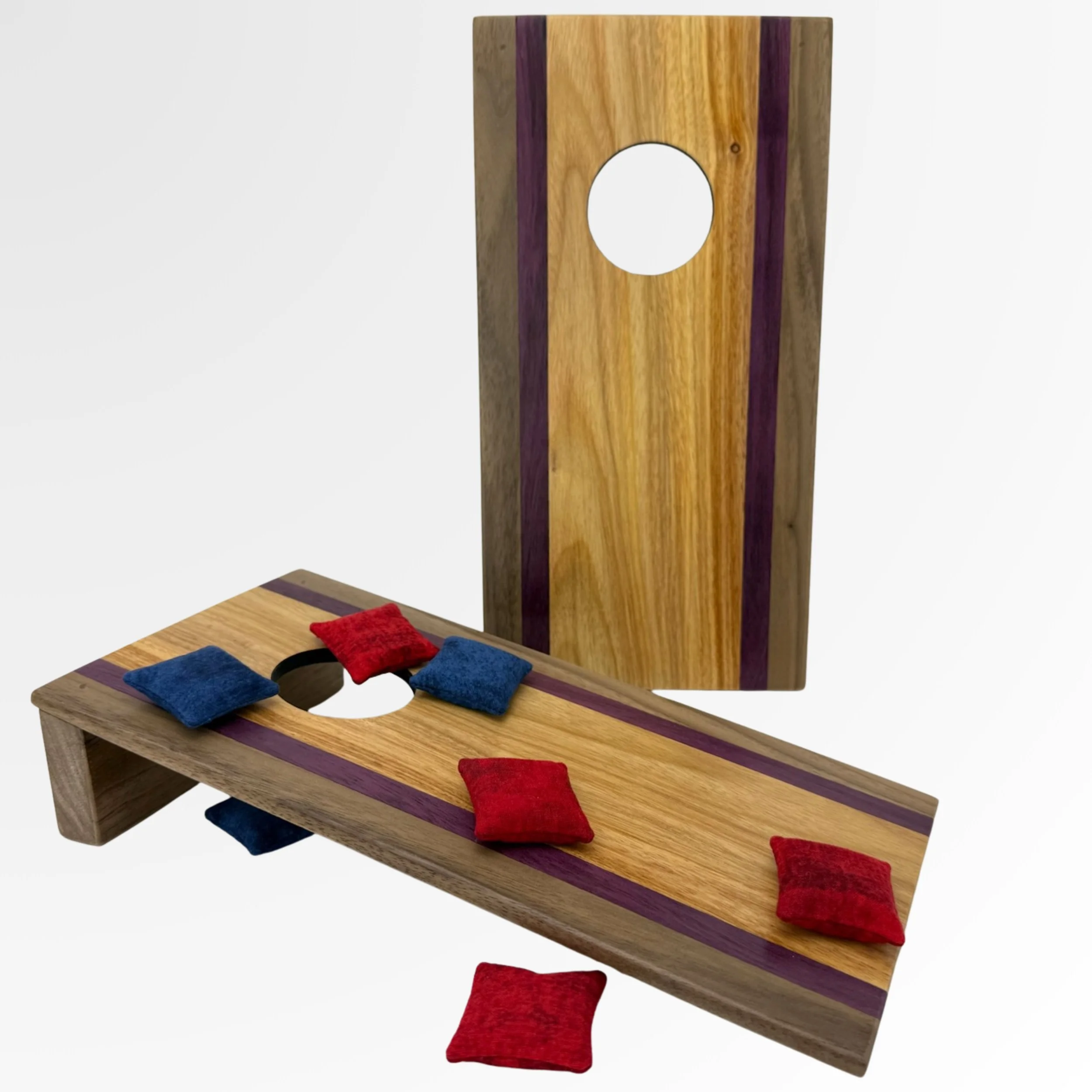 Handcrafted tabletop mini cornhole boards made from solid hardwood, walnut, purple heart, canary