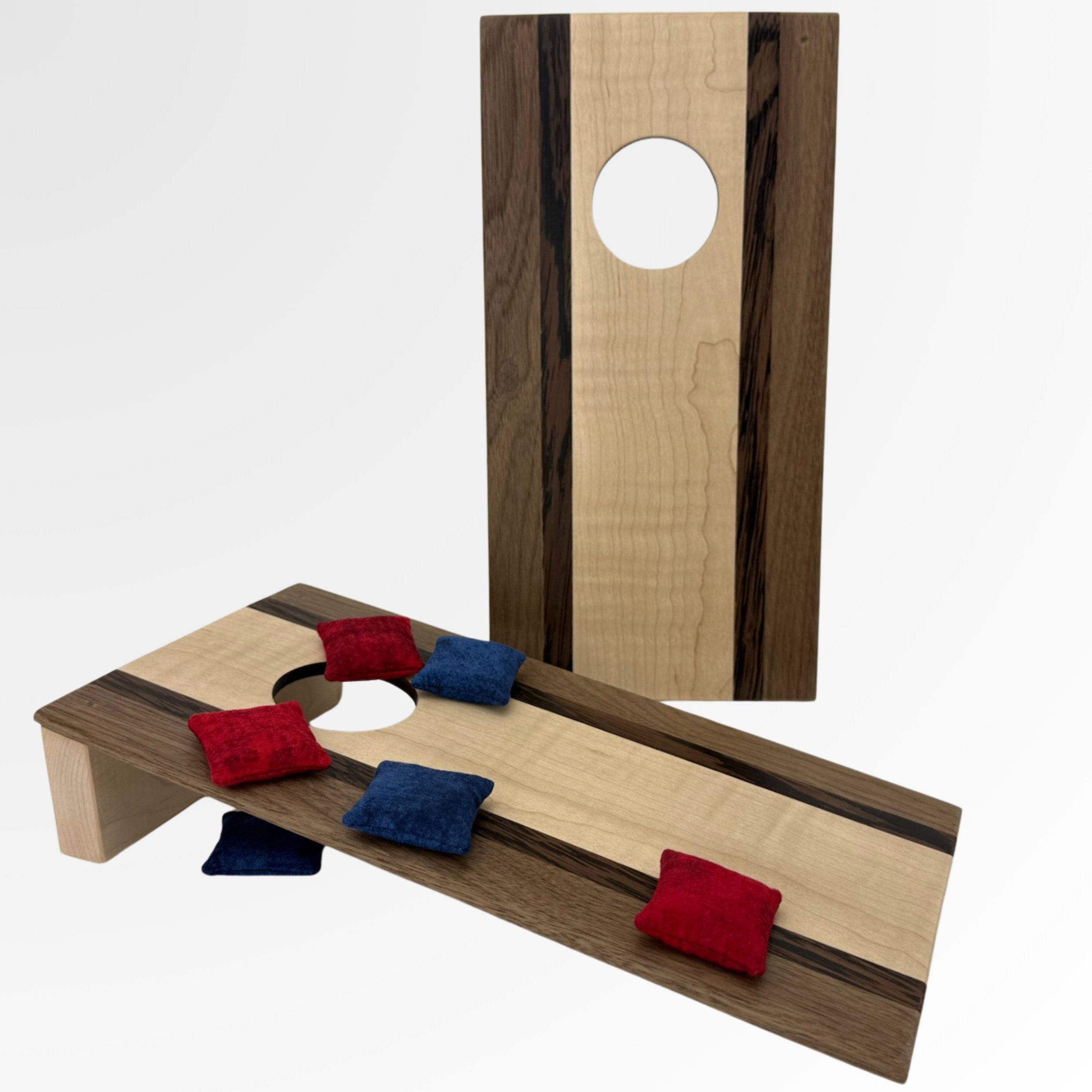 Handcrafted tabletop mini cornhole boards made from solid hardwood,  curly maple center with walnut and wenge border