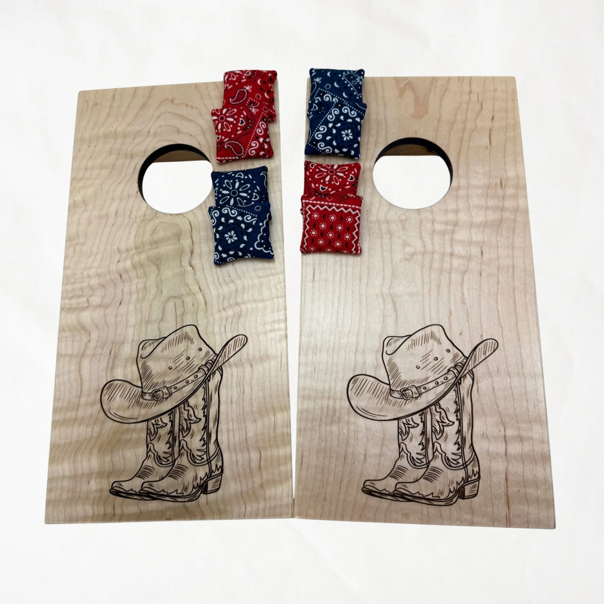 Handcrafted tabletop mini cornhole boards made from solid hardwood, maple wood, engraved with cowboy boots