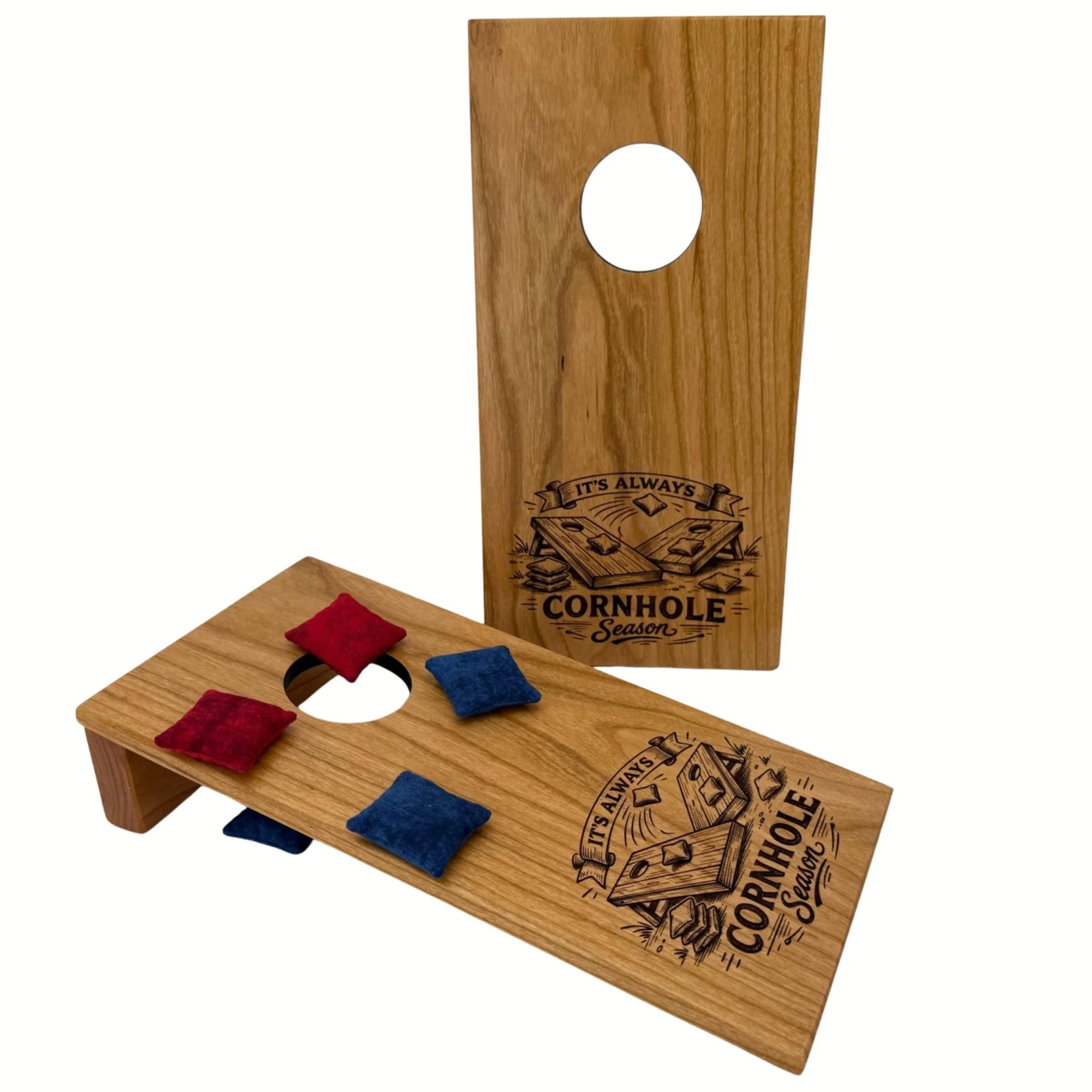 Handcrafted tabletop mini cornhole boards made from solid hardwood, cherry wood, and engraved with cornhole season