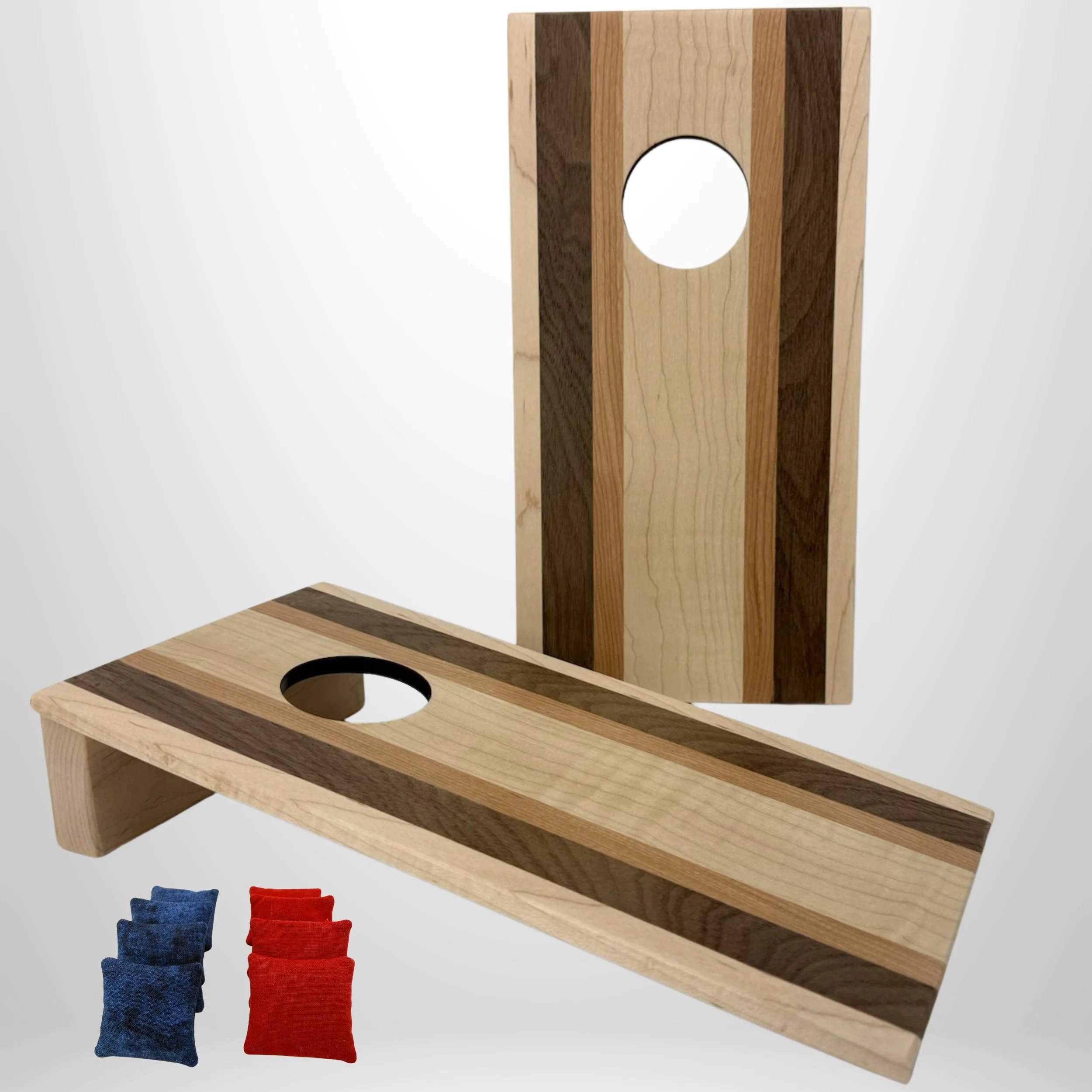 Handcrafted tabletop mini cornhole boards made from solid hardwood, curly maple with a walnut and cherry wood strip