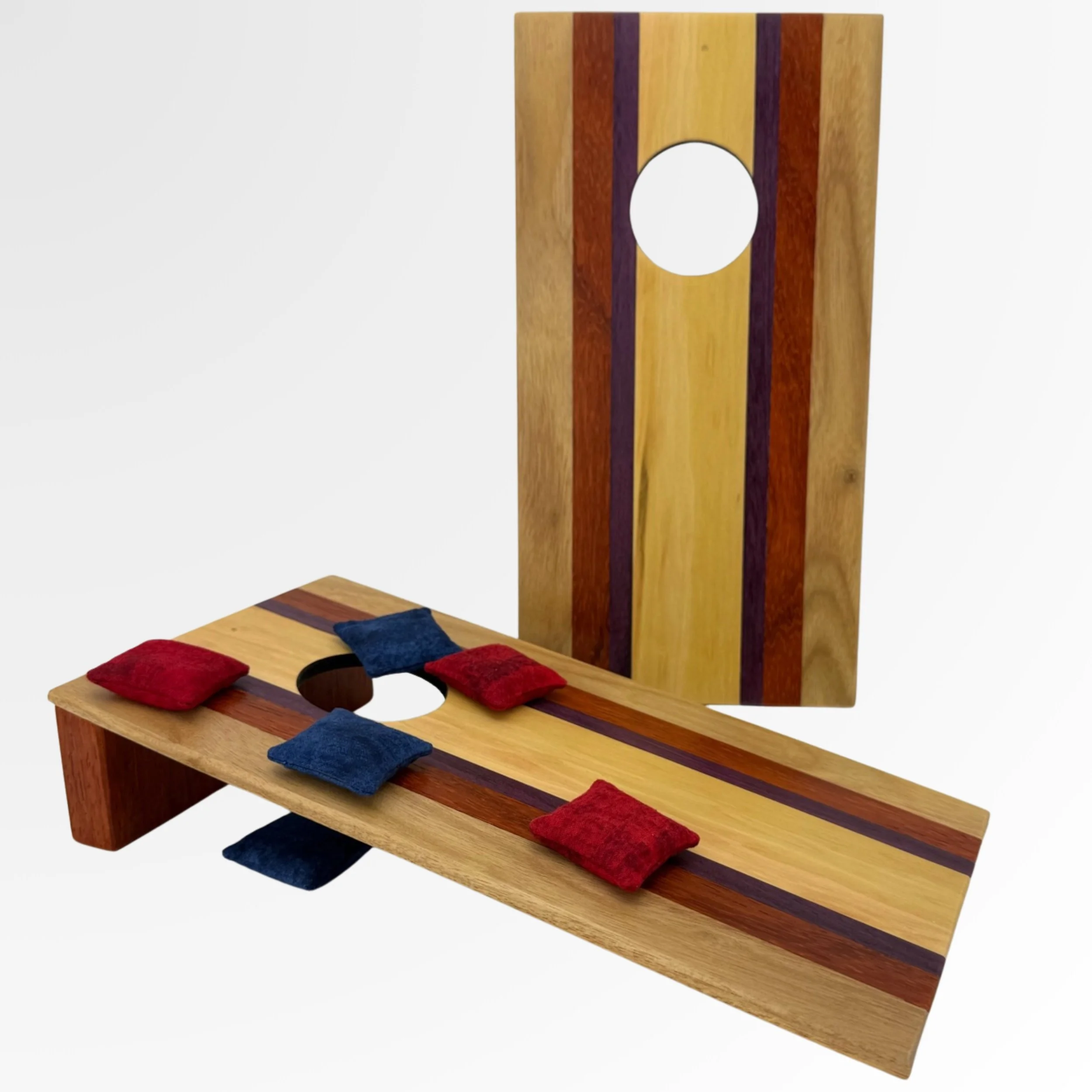 Handcrafted tabletop mini cornhole boards made from solid hardwood, Cherry wood border with exotic hardwoods such as canary, Purple Heart, and padouk