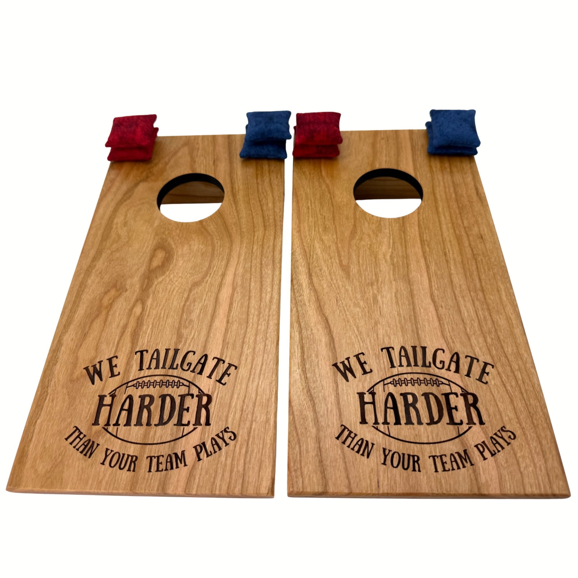 Handcrafted tabletop mini cornhole boards made from solid hardwood, cherry wood, and engraved with tailgating