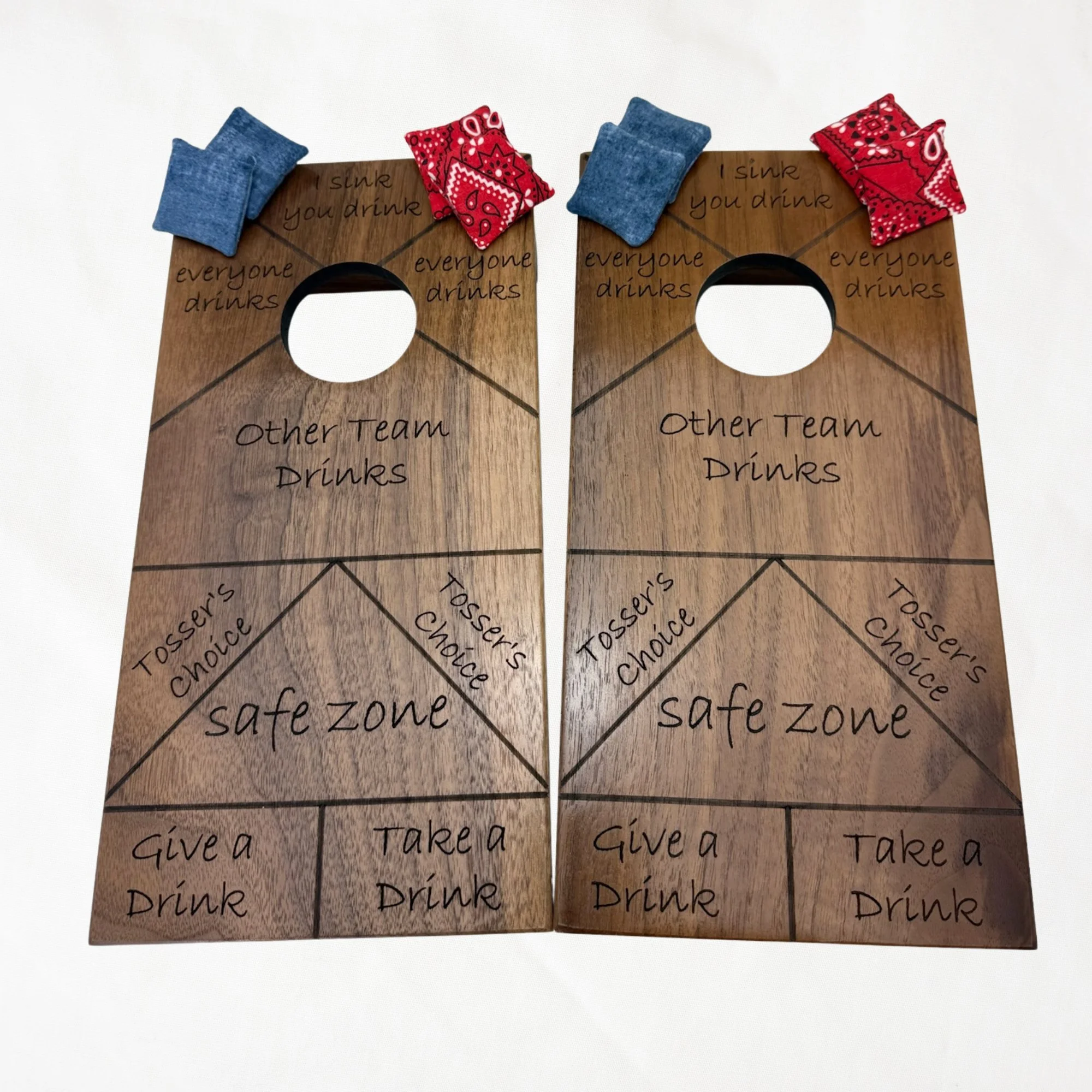 Mini Cornhole boards with 8 bags. Walnut wood engraved with drinking game.
