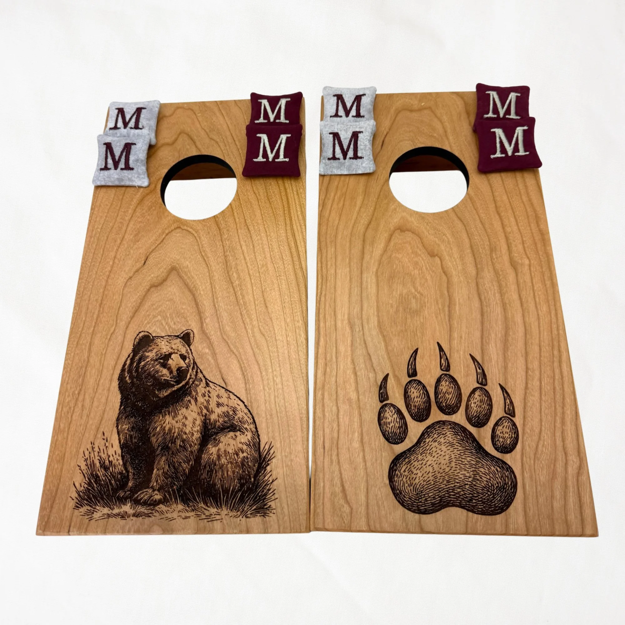 Handcrafted tabletop mini cornhole boards made from solid hardwood, cherry wood, engraved with grizzly
