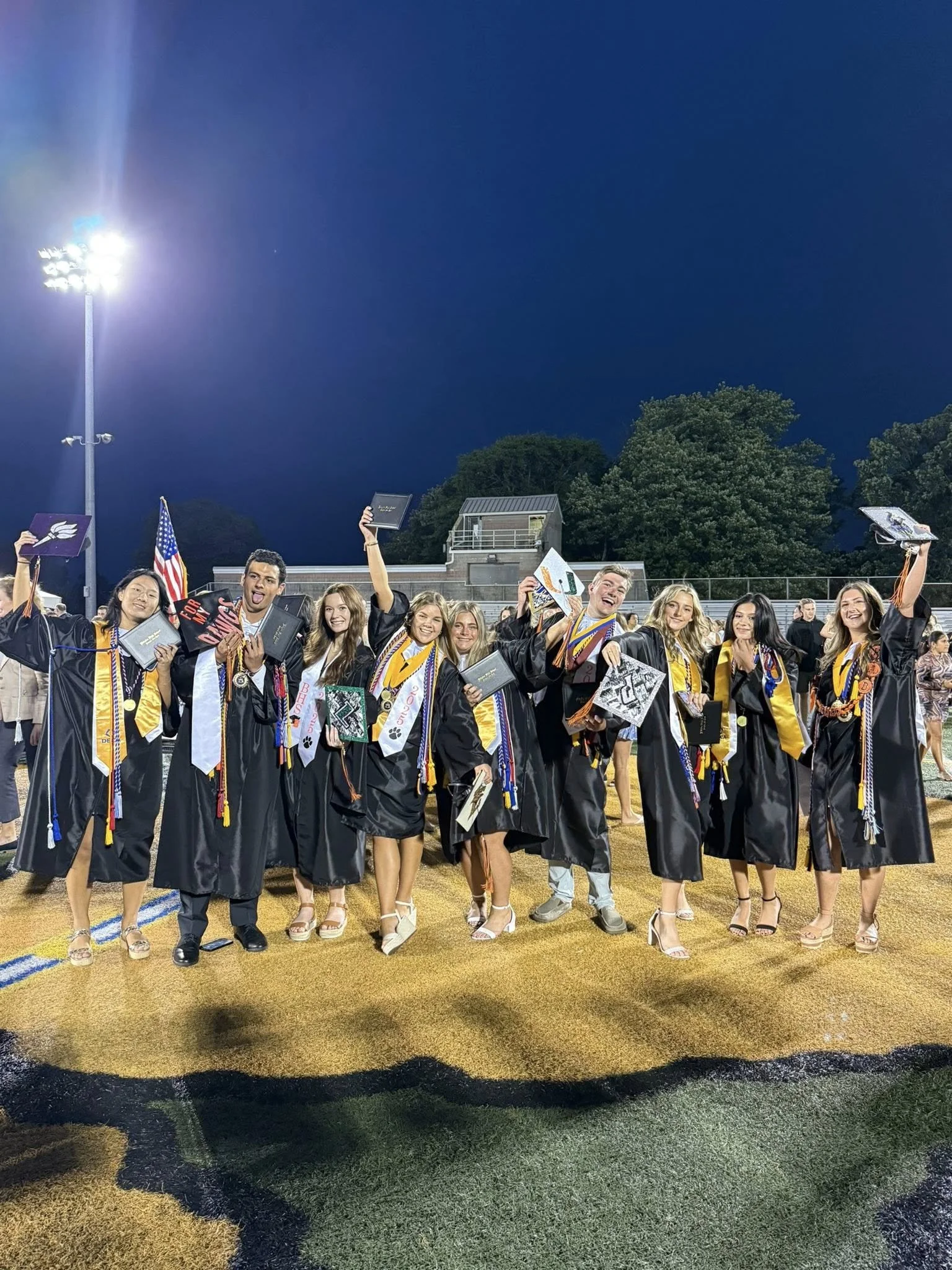 Smiling graduates of Babylon High School