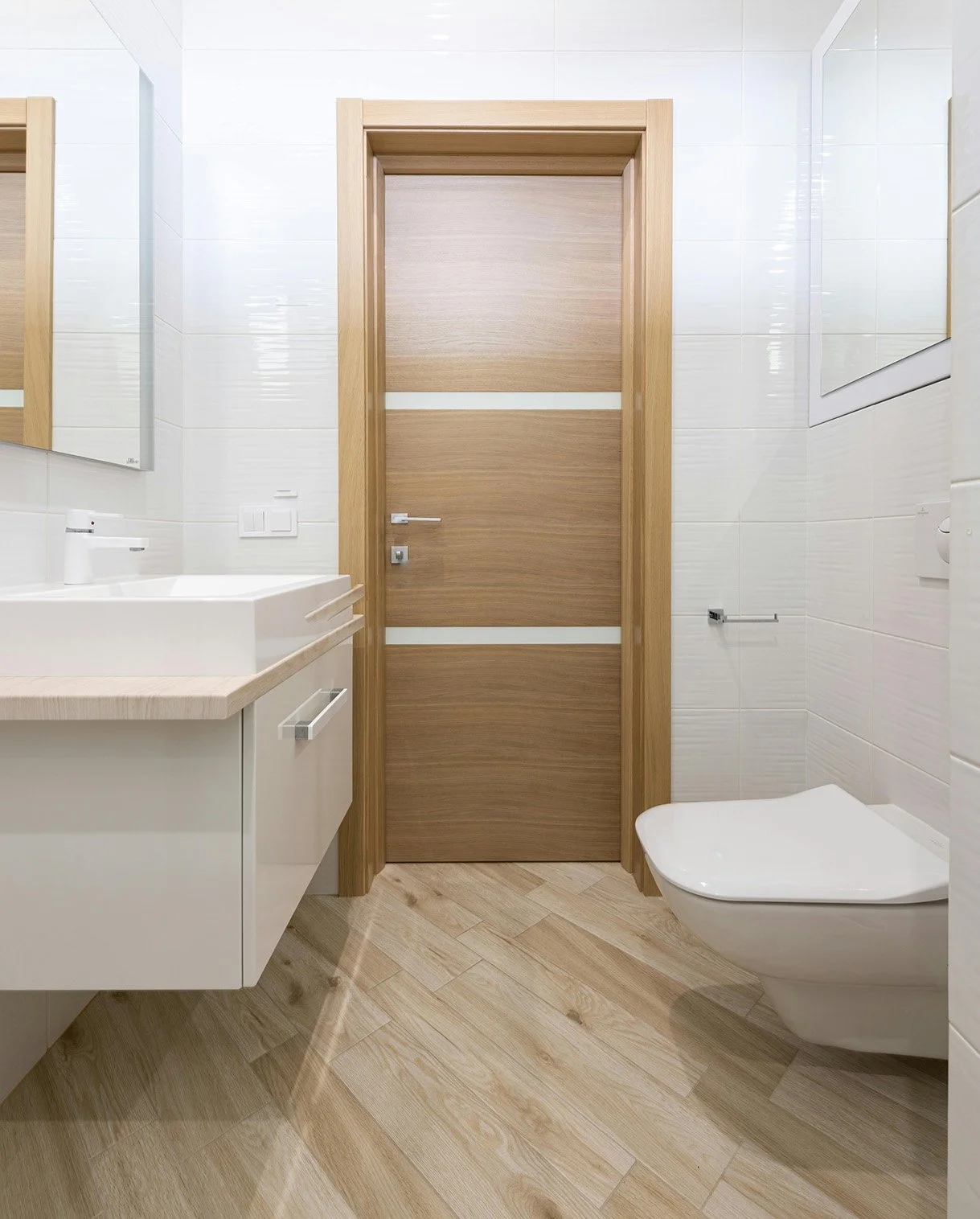 Modern, wood, interior bathroom door in a luxury bathroom.