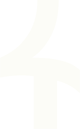 Close-up of a stylized black and white letter 'Q' with a curved design.