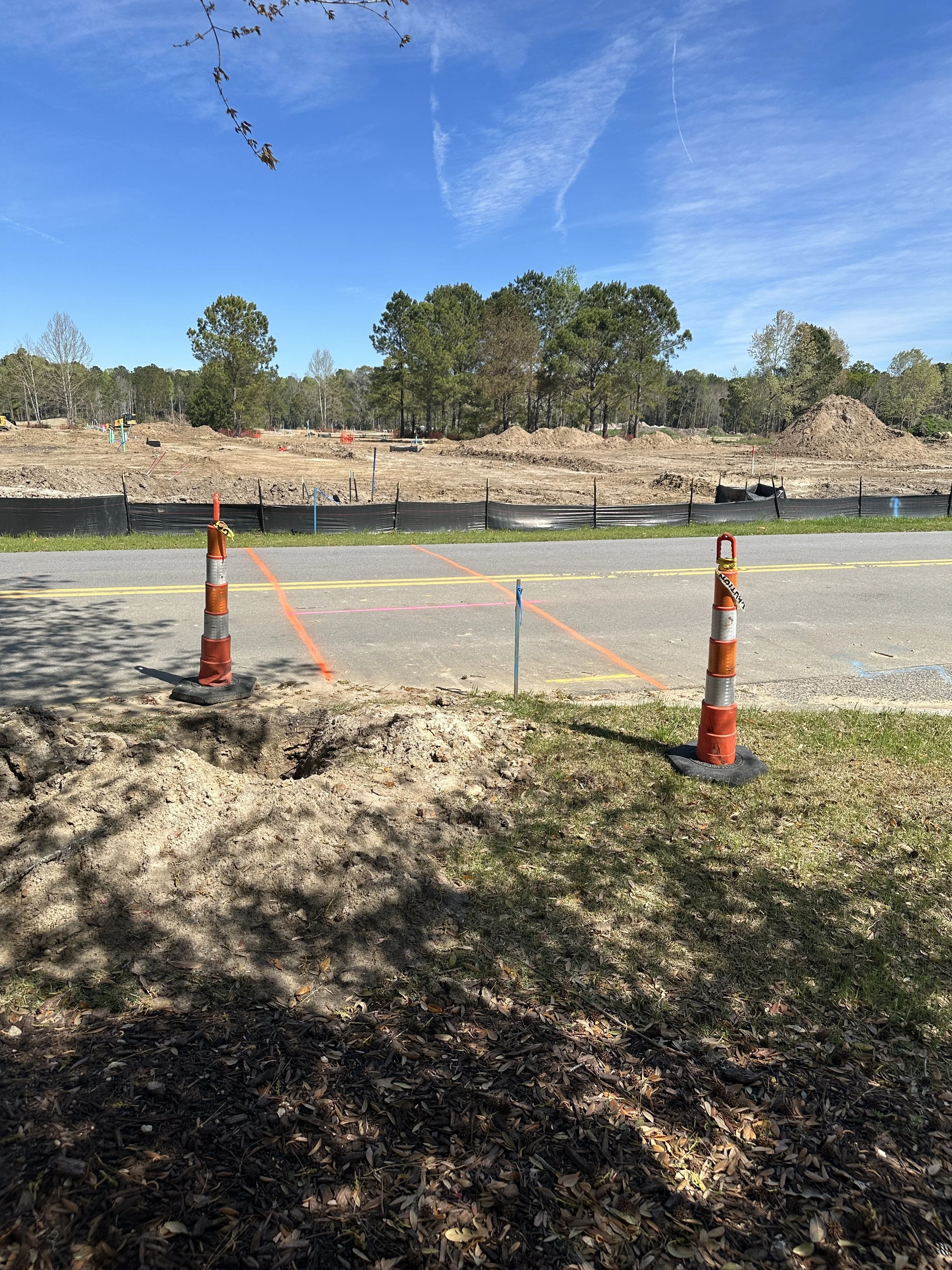 water line crossing at Village Row and Cherokee Farms Road