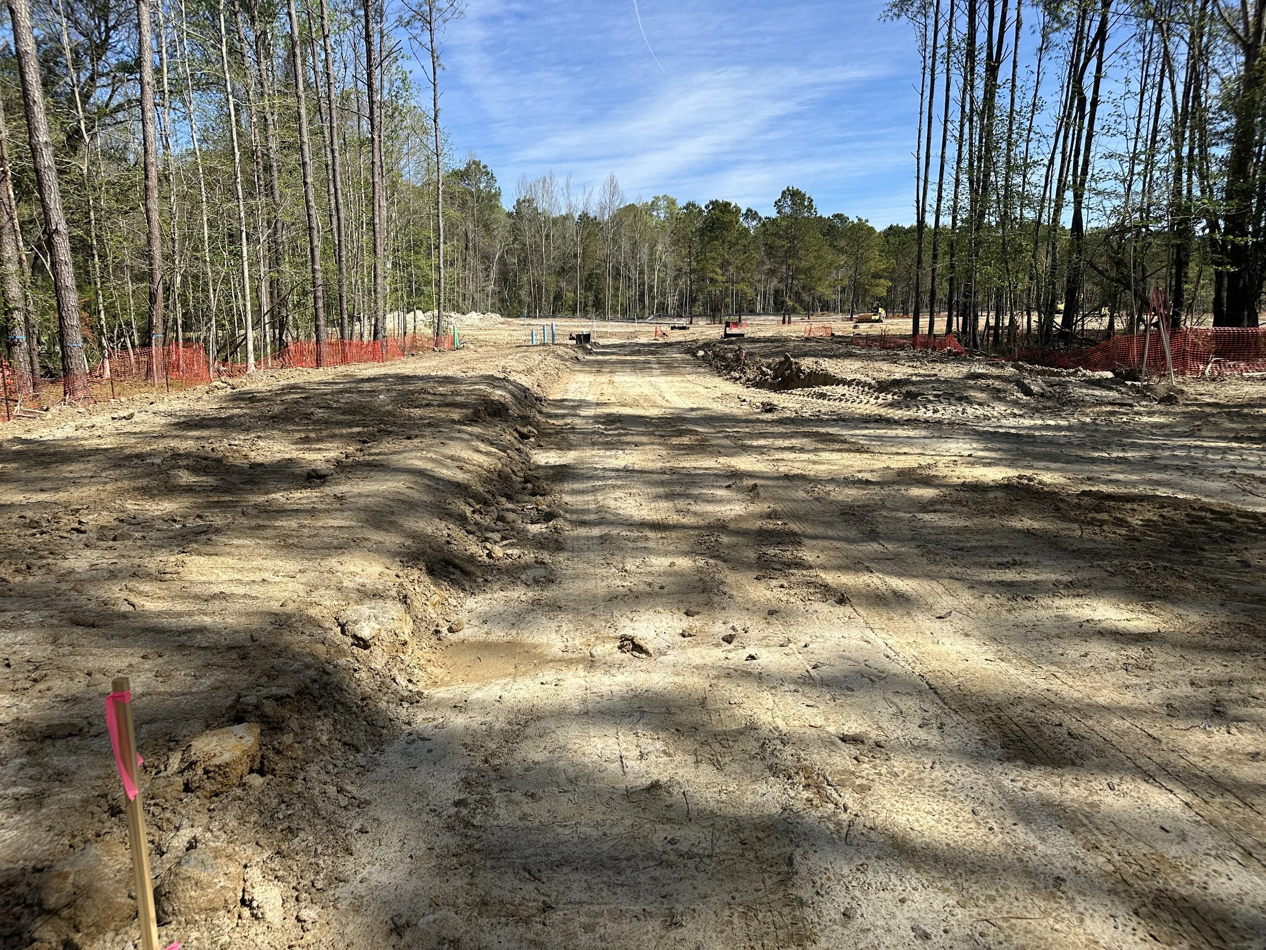 Road bed dug out for compaction of subgrade and prep for rock base