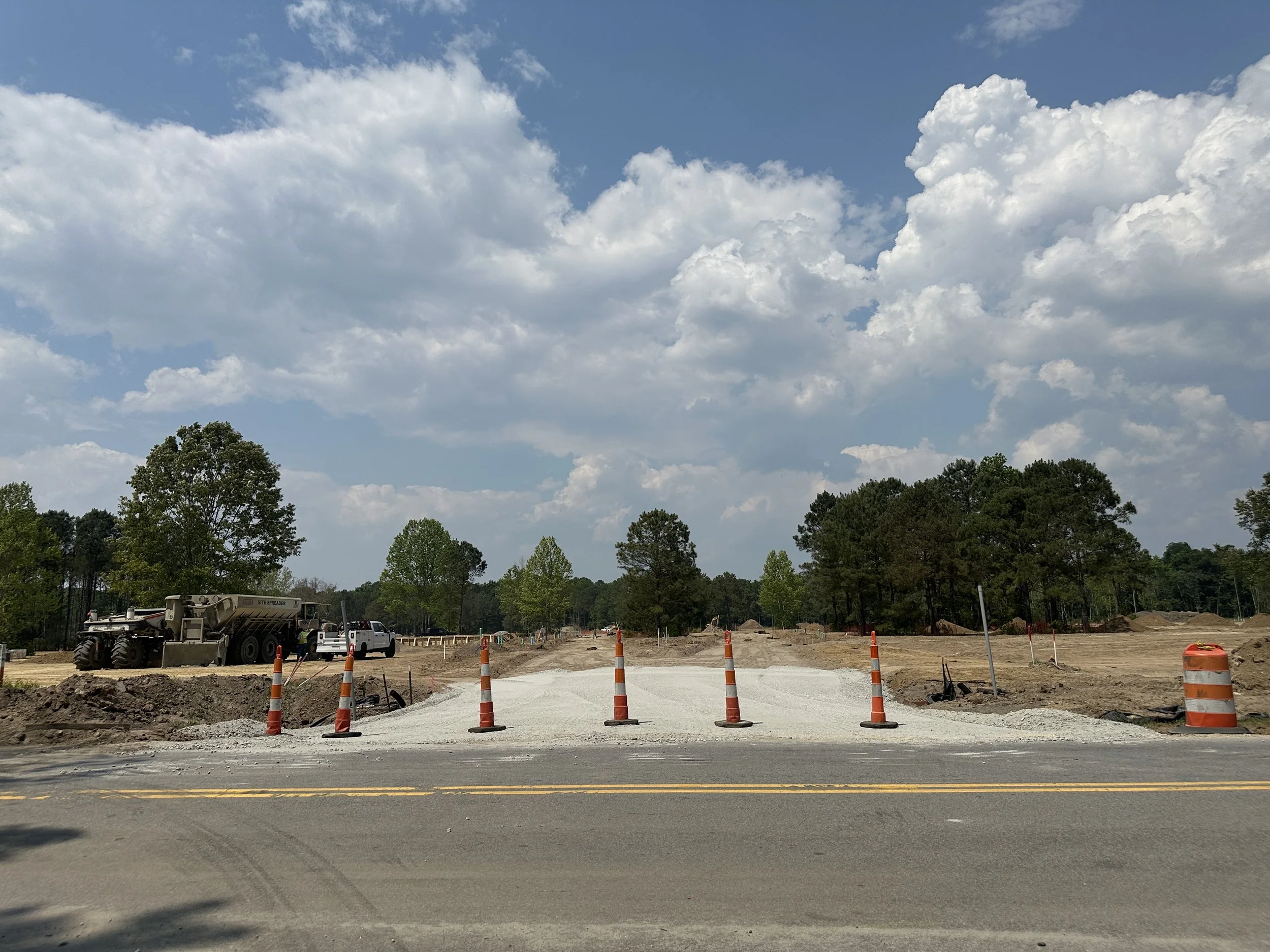New road connection off of Cherokee Farms Road to a new road in the Pondcrest Phase of Habersham with rock base starting to be put down.