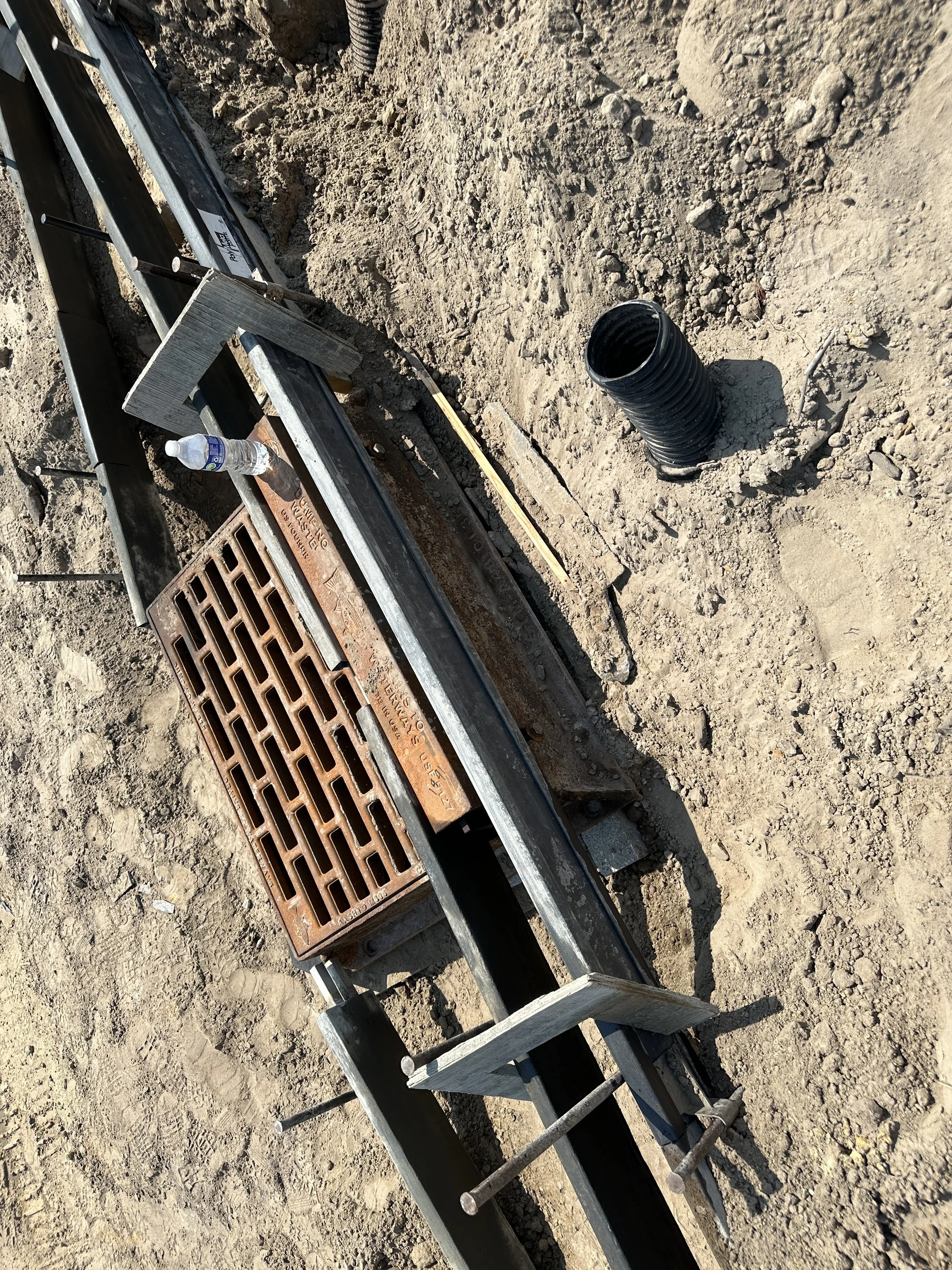 curb inlet with vertical curb formed up ready for pouring on new street in Pondcrest Phase of Habersham