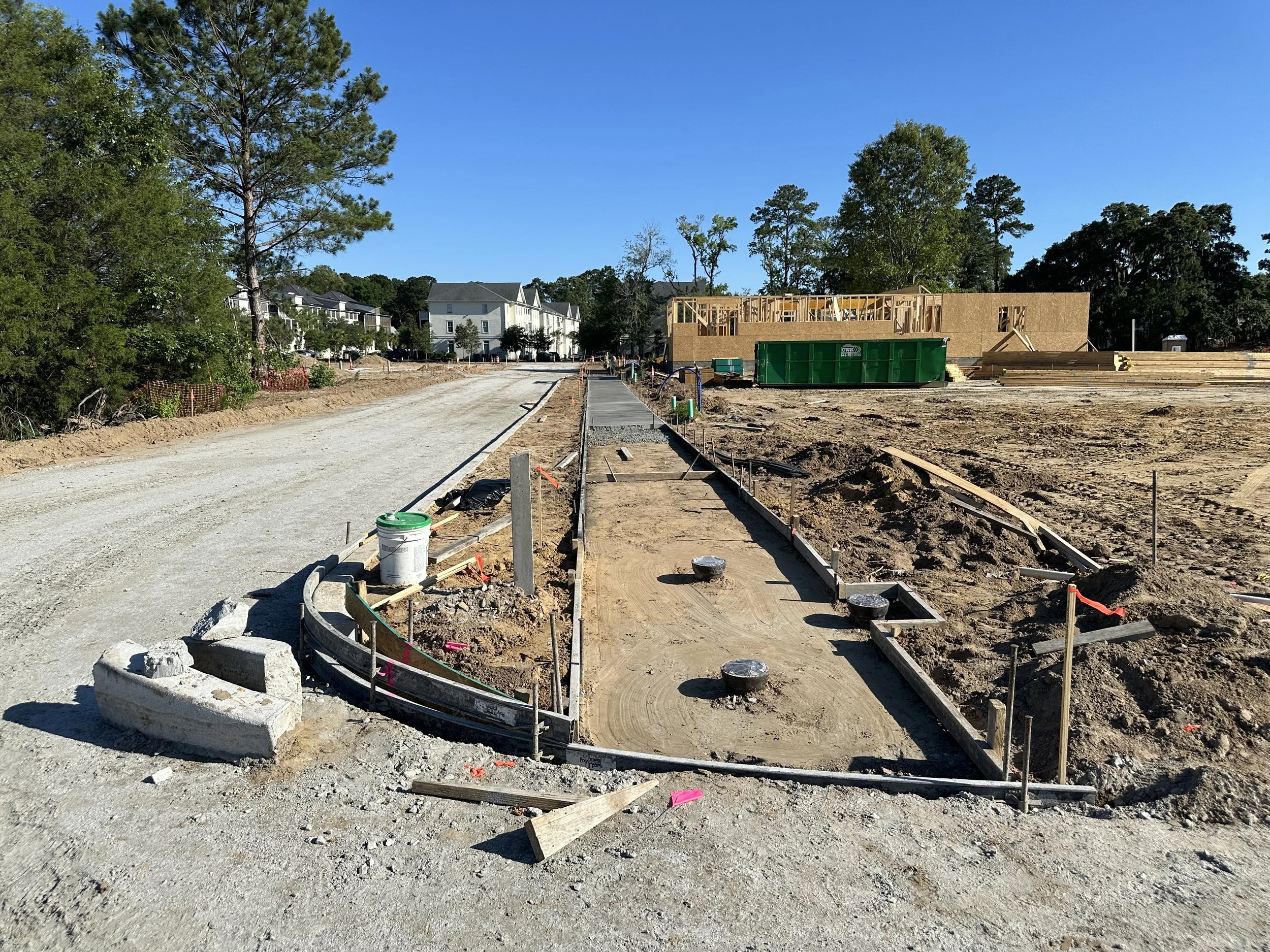 Habersham Pondcrest Phase new sidewalk being formed and poured down Louis Pinckney Sr. Avenue