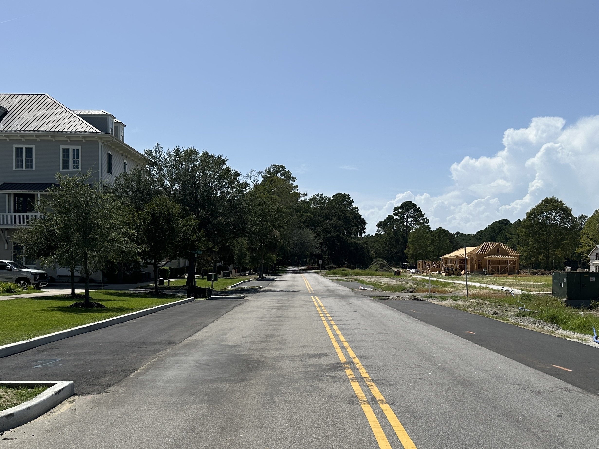 Curbed and no curb parallel parking spaces on Cherokee Farms Road as part of Habersham Pondcrest Phase