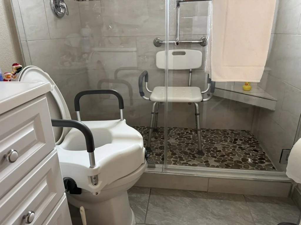 Raised toilet seat and shower chair, durable medical equipment setup in home