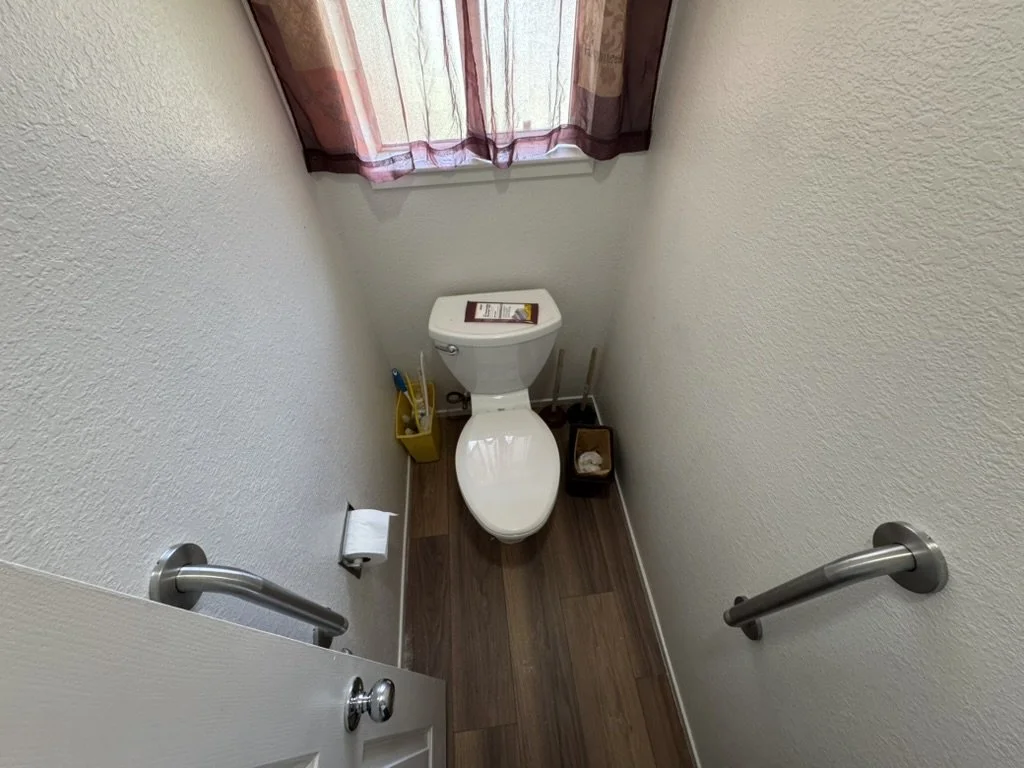 Toilet area grab bars with ambient lighting, bathroom safety modification