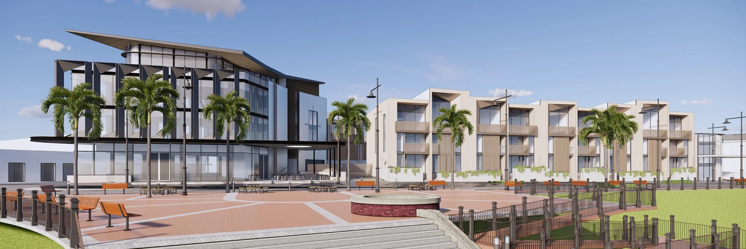 Modern residential building complex with a landscaped courtyard, palm trees, benches, and street lamps.