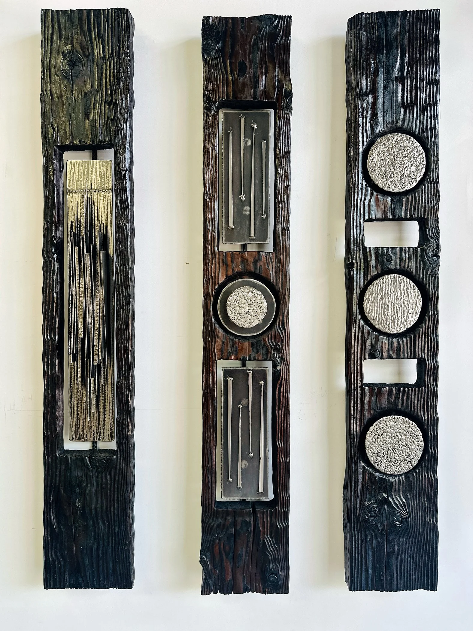 PageCarlos_steel&charredwood_12x71x5 each_7500.jpg