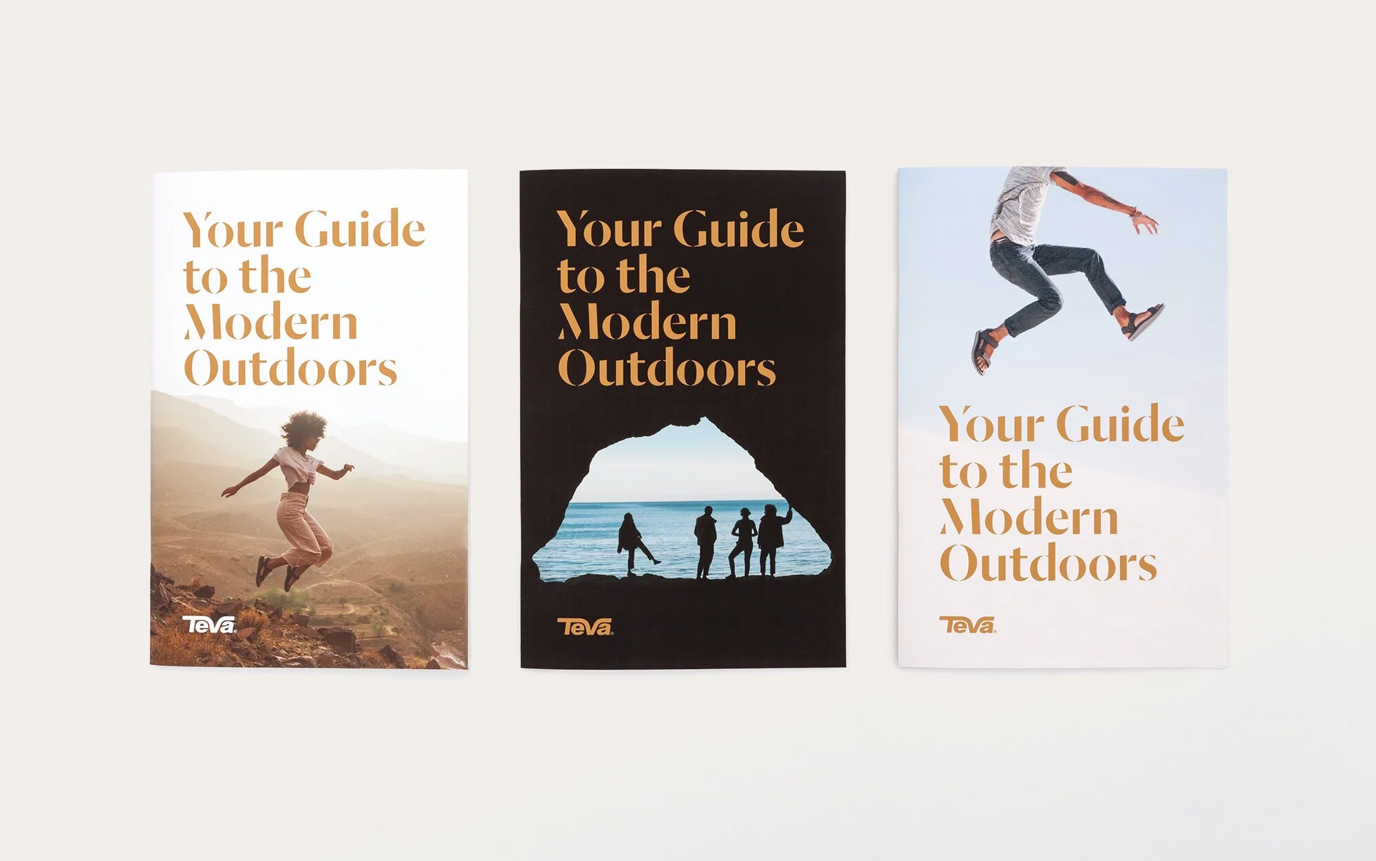 Three outdoor activity guides with the title 'Your Guide to the Modern Outdoors'. The left cover features a woman jumping in a mountainous landscape, the middle cover shows a group of people standing in a sea cave, and the right cover has a person jumping in the air against a sky background.
