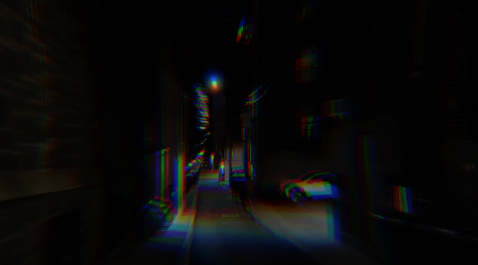 A dark street at night with colorful glitch-like effects and reflections of lights.