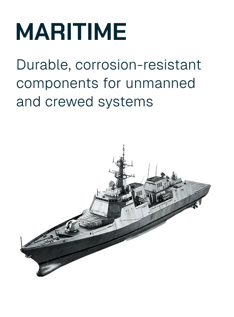 A military maritime vessel with annotations about durable, corrosion-resistant components for unmanned and crewed systems.
