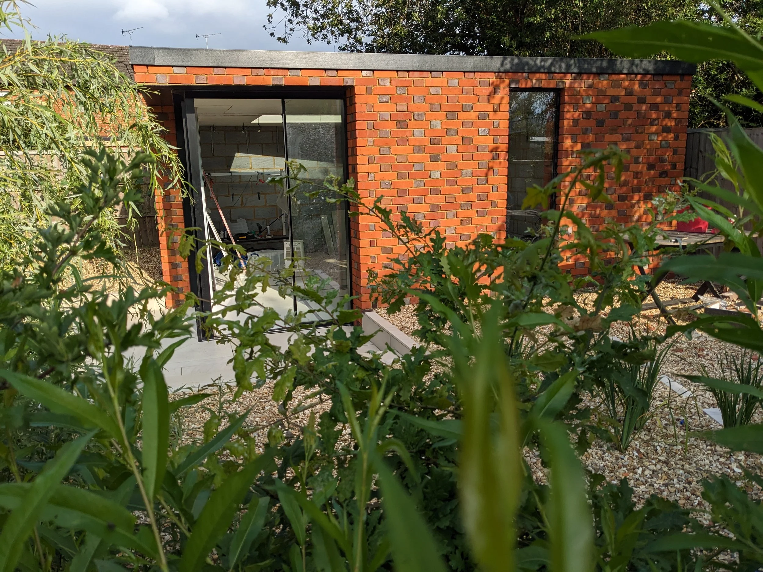 GALLERY EXTERIOR THRU TREES.jpg