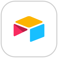 A colorful logo with geometric shapes in yellow, pink, and blue.