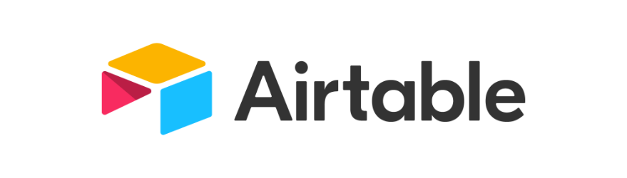 A logo with a hexagonal shape divided into four colored sections: yellow, pink, blue, and black, next to the word "Airtable" in black text.