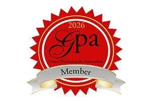 CFP 2026 member badge for the Grand Professionals Association with a red and gold design and a ribbon that says 'Member.'