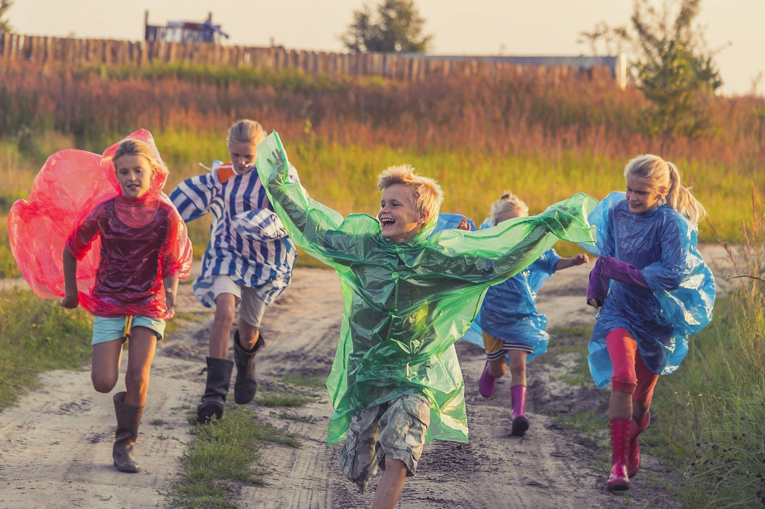 children running with smocks