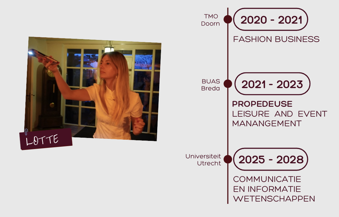 A woman with long blonde hair wearing a yellow shirt, holding a smartphone out to take a selfie in a room with a window and trees visible outside at dusk.