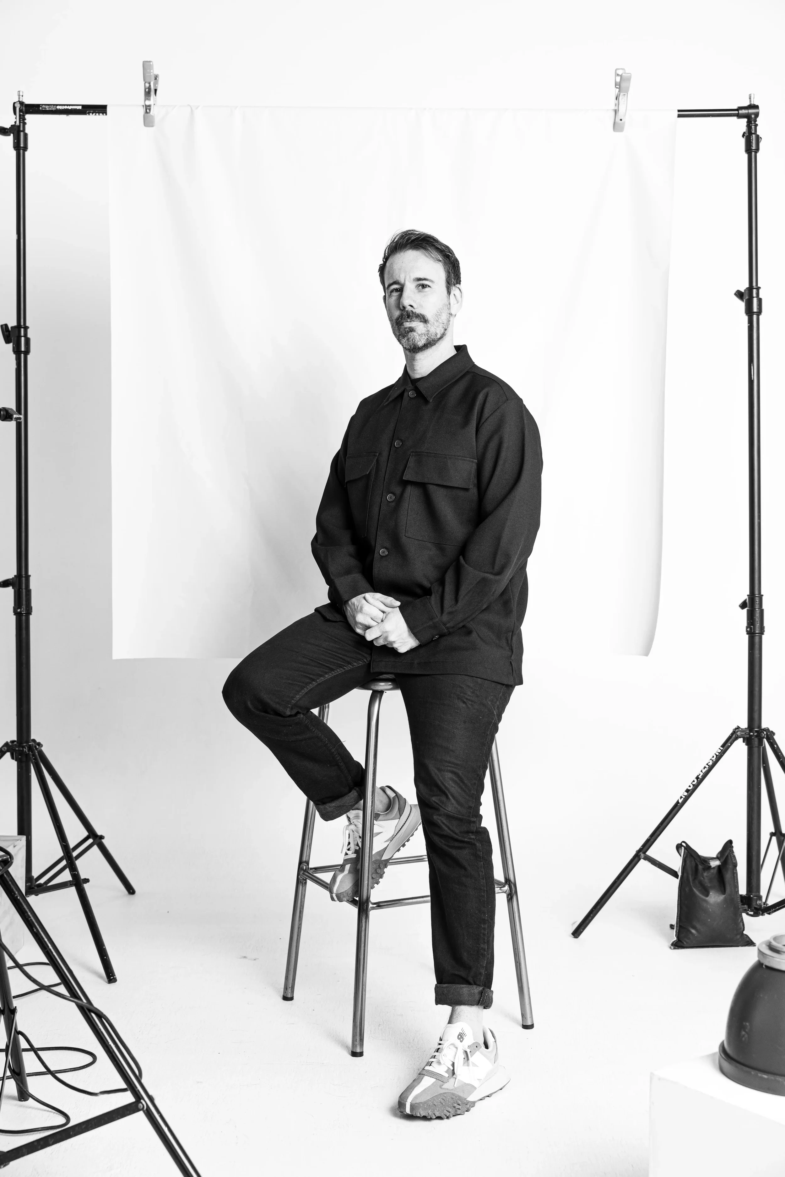 Portrait of Jake Siddall, creative director and art director, photographed in studio