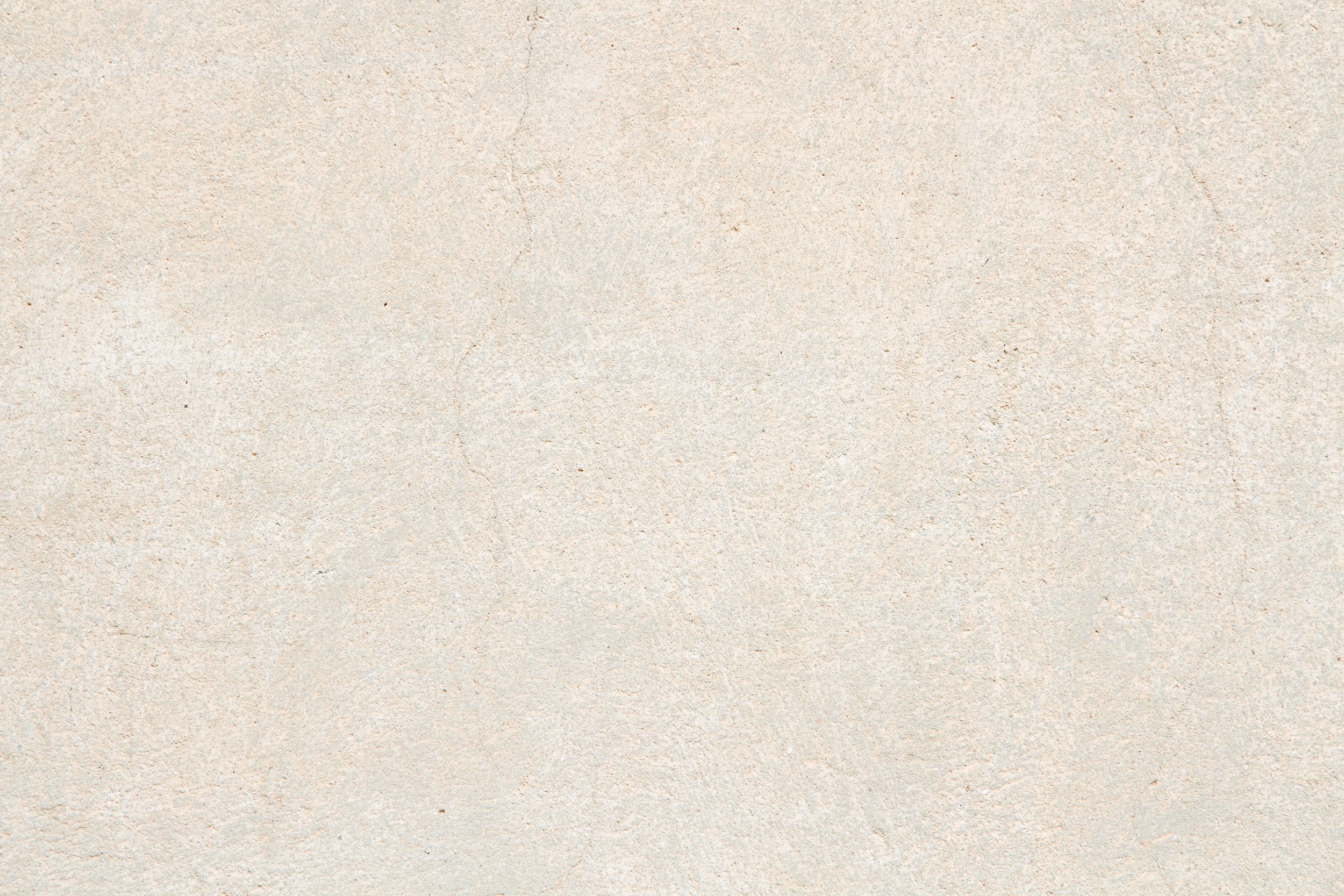 A photo with a beige textured background.