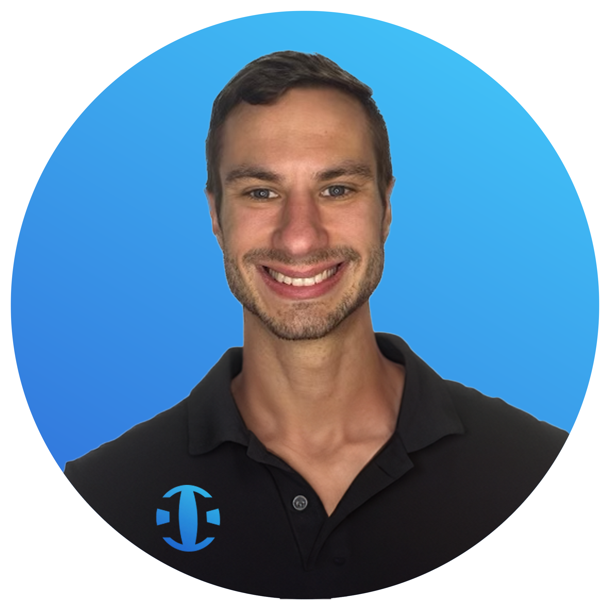 Smiling man with short brown hair, wearing a black collared shirt with a blue logo, against a blue background