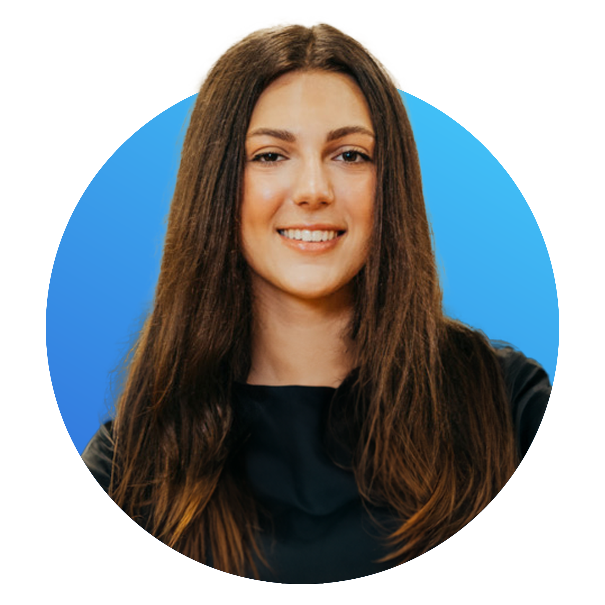 Portrait of a young woman with long brown hair, smiling, wearing a black top, against a blue background.